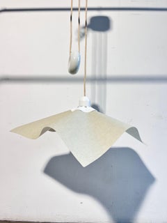 Area ceiling lamp design by Mario Bellini for Artemide