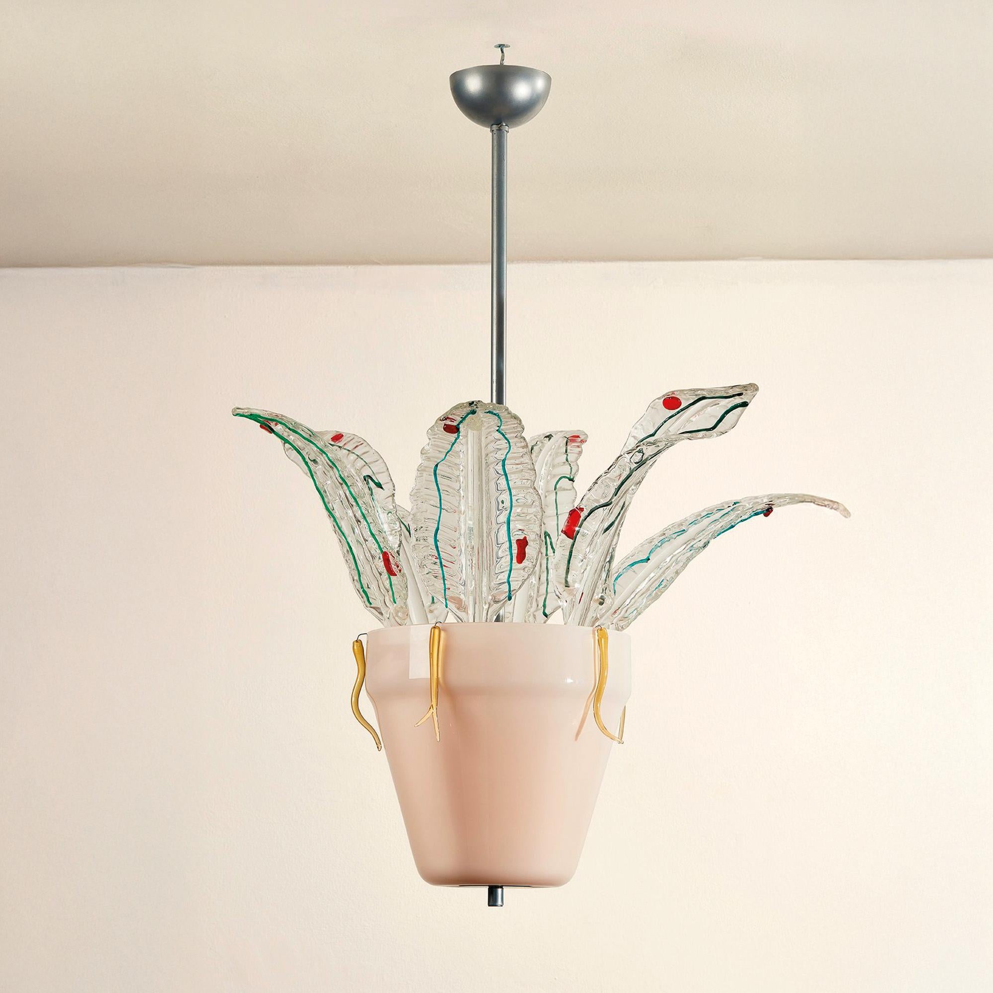 Lampada da soffitto Suspension disegnata da Ugo la Pietra nel 1970 e prodotta in vetro di Murano a Venezia. Interamente realizzata a mano da mastri artigiani della tradizione Muranese, questa lampada porta con sè una storia secolare di saperi e