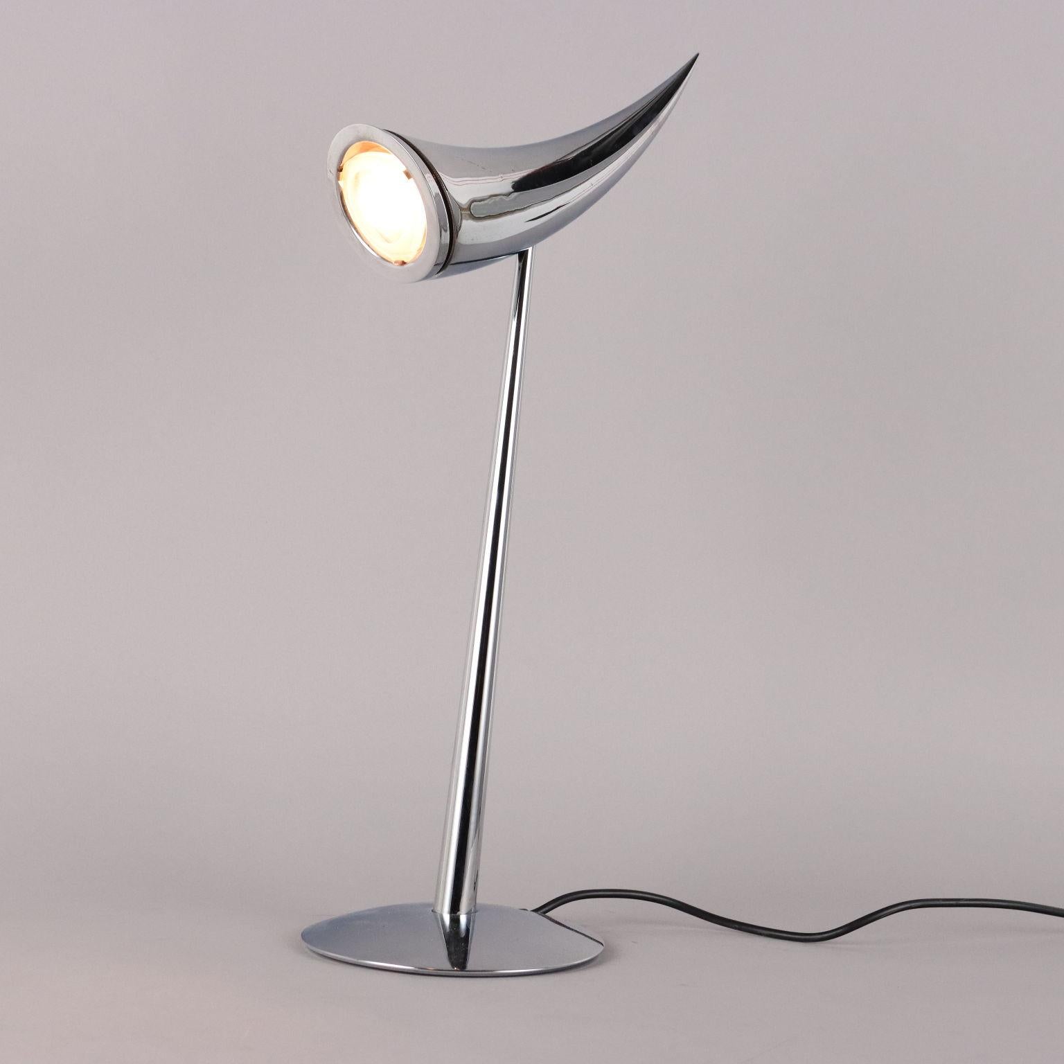 Iconic table lamp, aluminum and chrome metal.