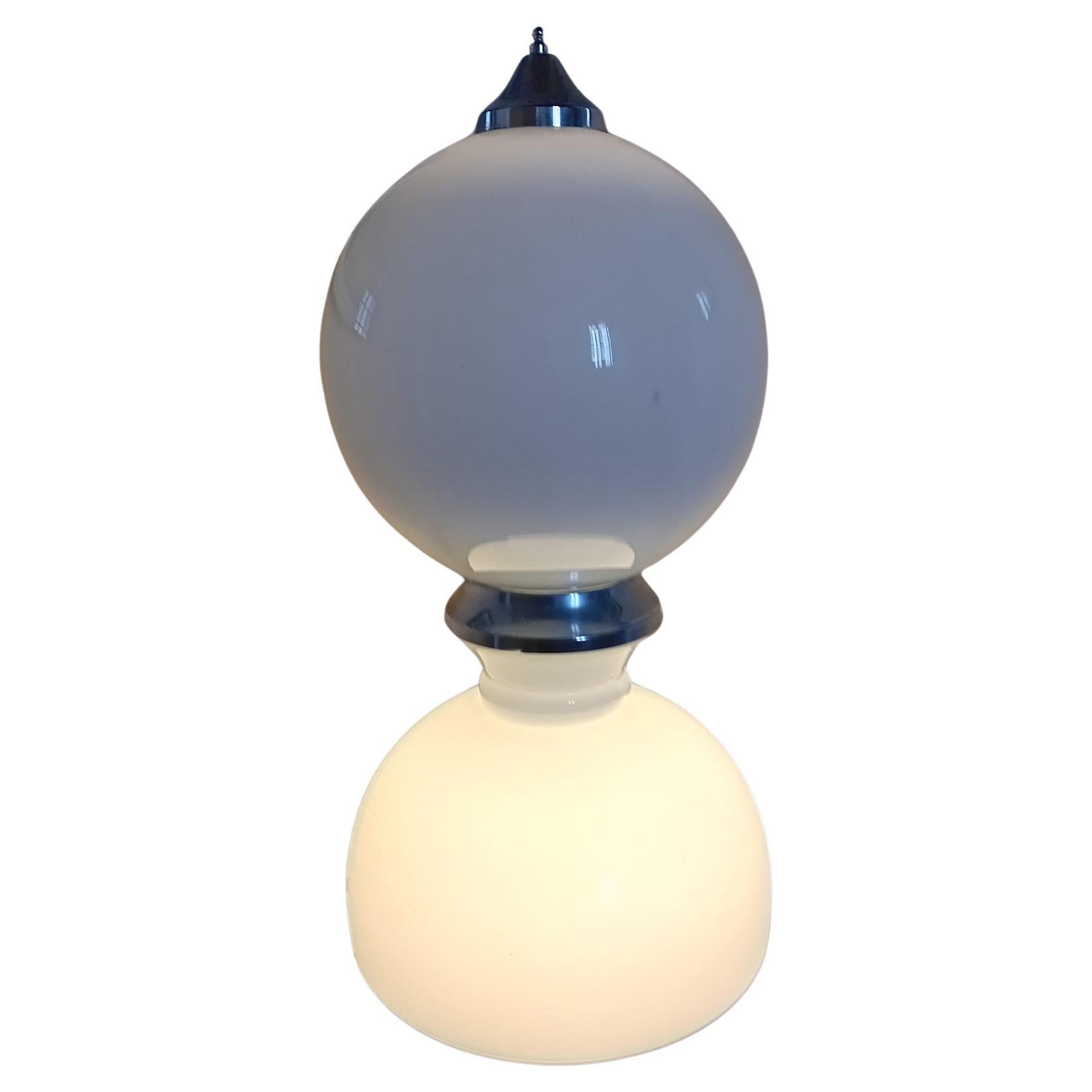 Lampada in vetro artistico e acciaio  di Goffredo Reggiani produzione Nason Murano Venezia 1960 , Doppia luce , due lampadine bellissima lampada originale ed autentica del 1960 , filo elettrico e accensione originali , perfettamente funzionante. 
Si