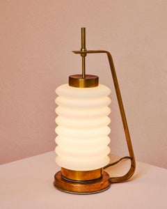 Pleated glass table lamp design by Angelo Lelii, for Arredoluce, Italy