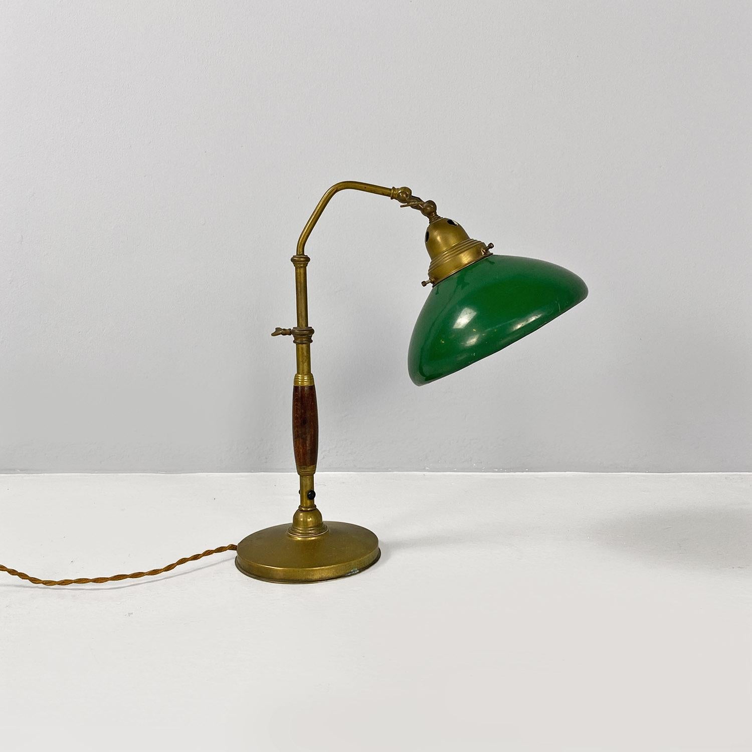 Ministerial table lamp with wood and metal stem and adjustable green enameled metal shade.
Ca.1920
Good Condition
Measurements in cm 30x15x43h
This serious-looking green and gold metal table lamp, owned by the Italian Ministry as reported by the