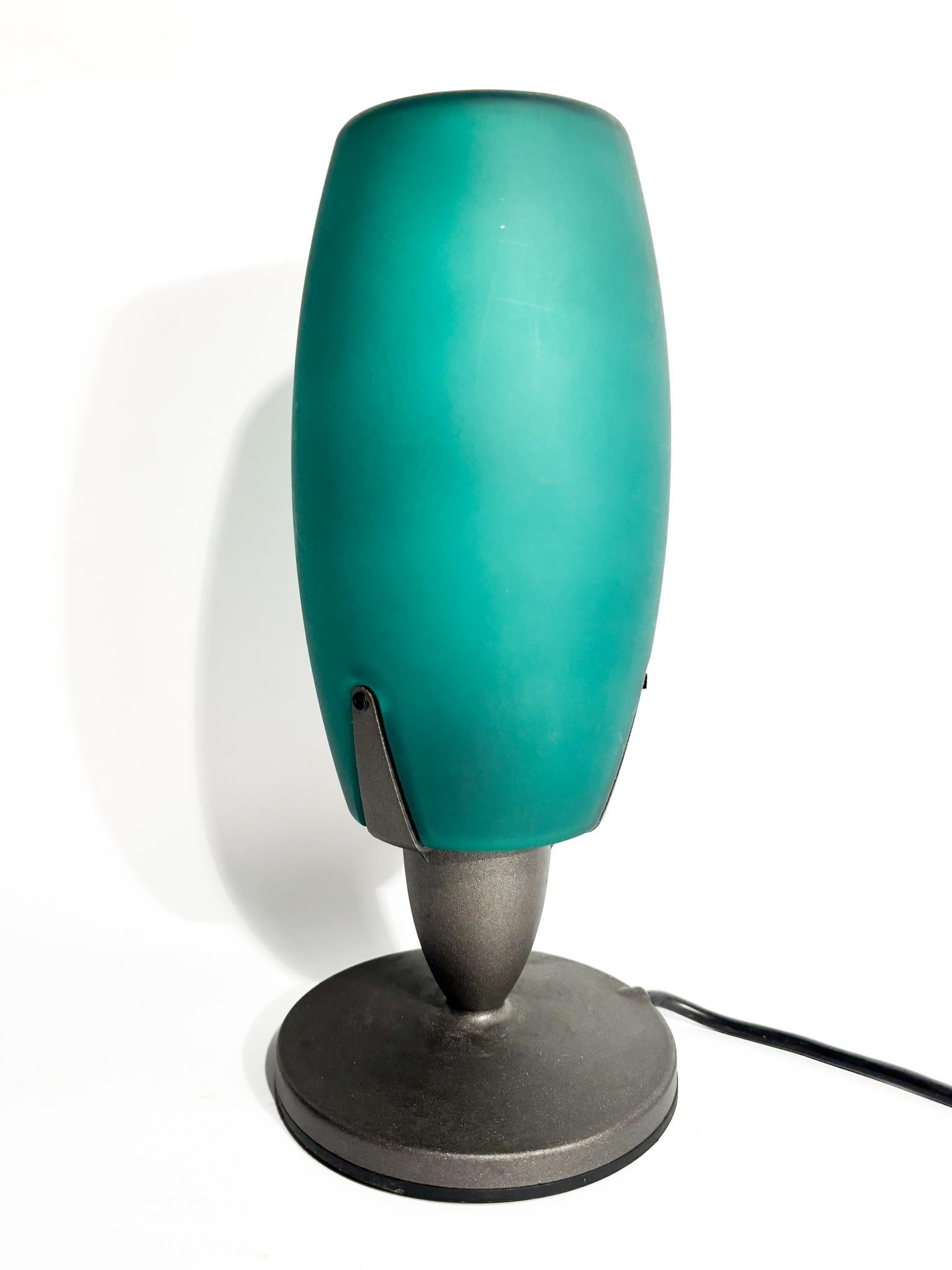 Green glass table lamp, 'Carina' model designed by Giampiero Tonetti in the 1980s

Ø cm 12 h cm 27

Giampiero (or Gianpietro) Tonetti is an Italian designer, born in Cremona in 1958. He lives and works in Lodi. He is best known for his work in