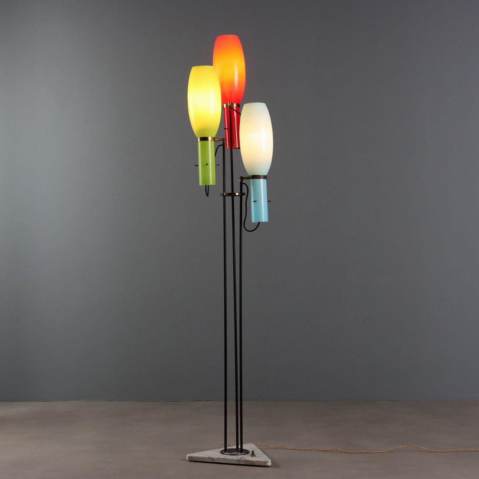 Elegant vintage floor lamp with triangular marble base, black lacquered metal stem, brass details, red, green and blue glass diffusers.