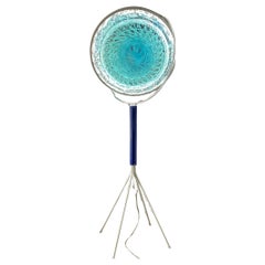 Floor lamp with iridescent Murano glass reclining disc