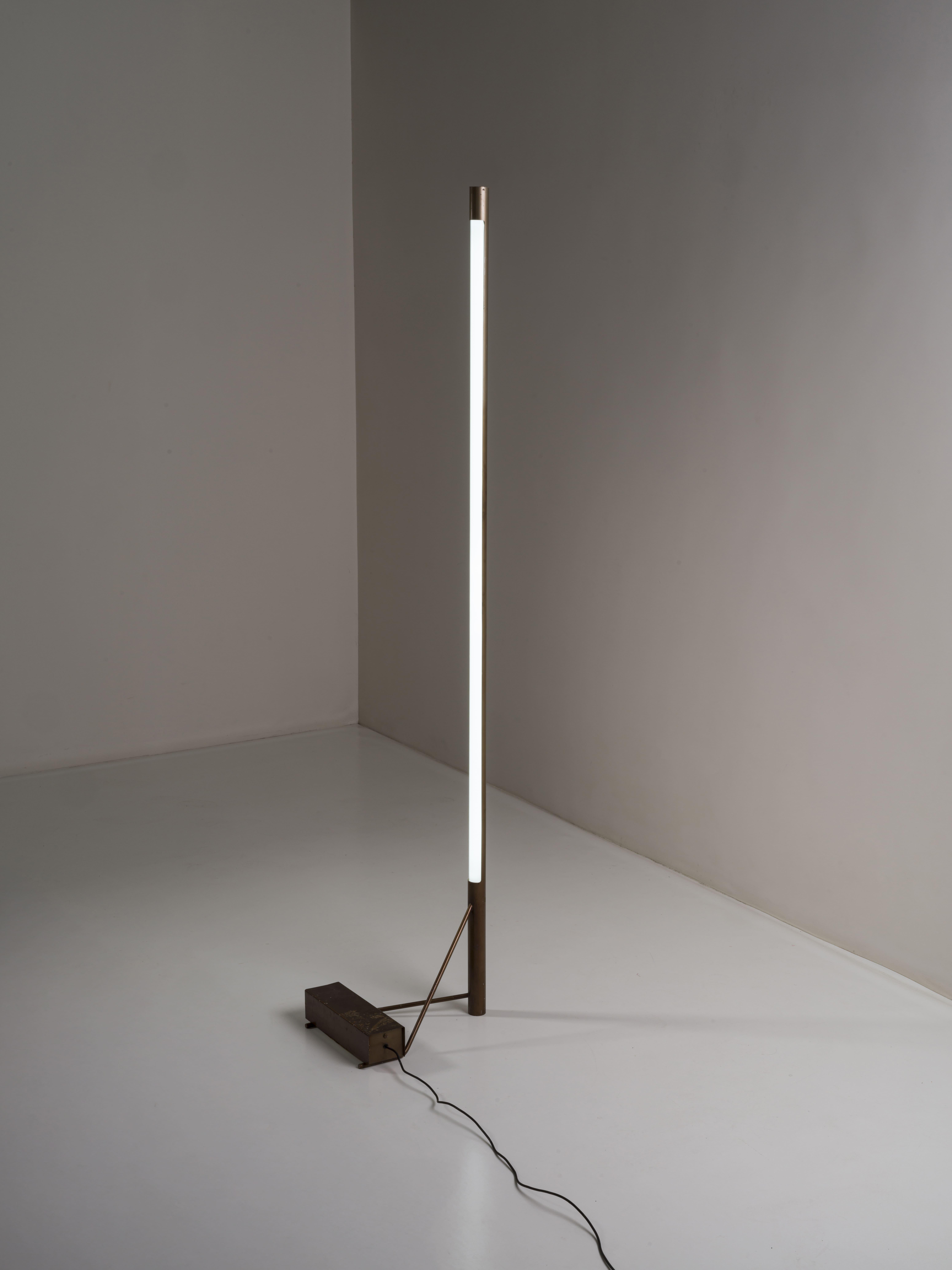 Floor lamp mod 1063 by Gino Sarfatti for Arteluce, Italy 1953.
The lamp you are looking at is painted in a very unusual gold color, which probably makes it unique, as confirmed by the heirs of Gino Sarfatti themselves, who think it was commissioned