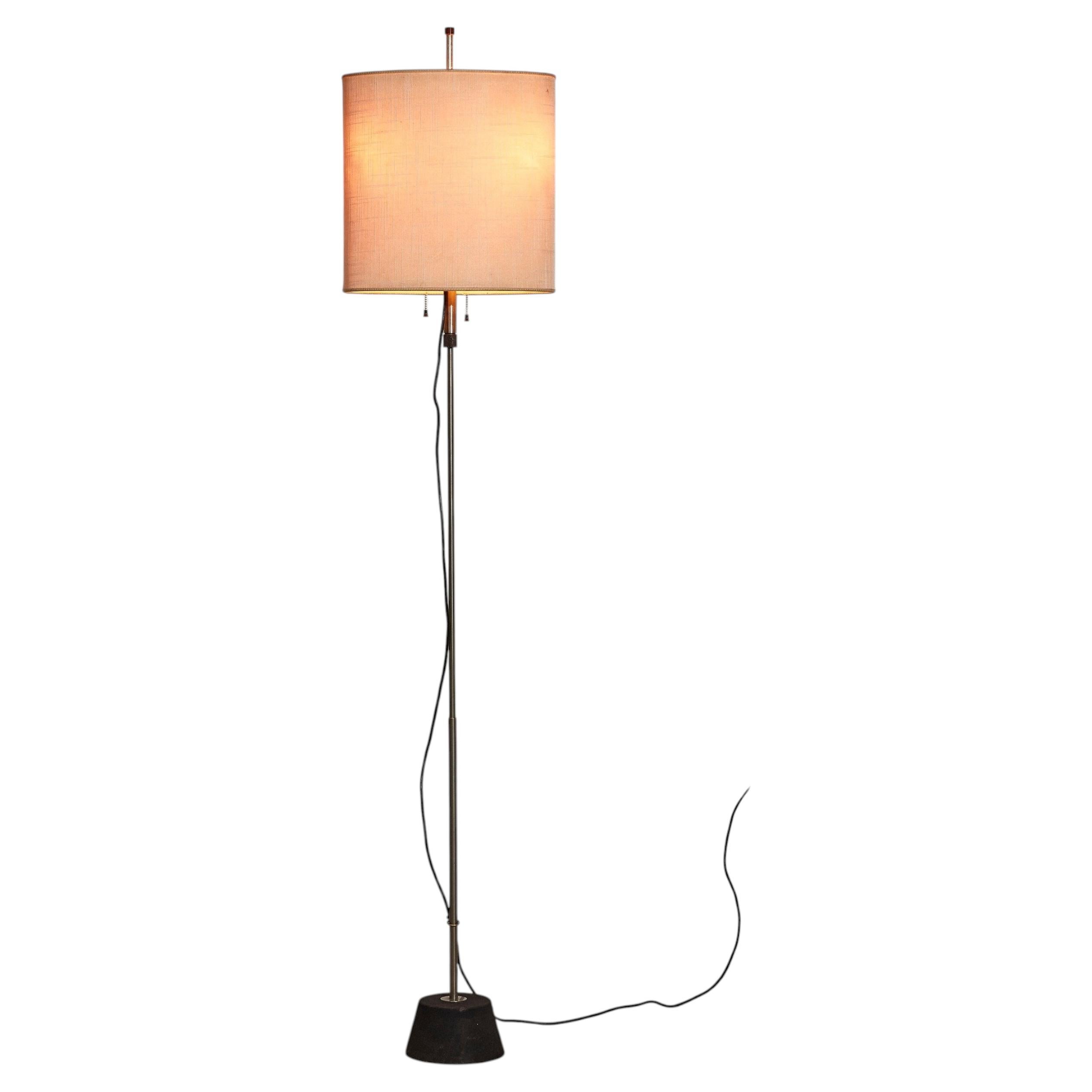 Floor lamp mod. 4097 with height sliding shade Stilnovo, ca. 1960.