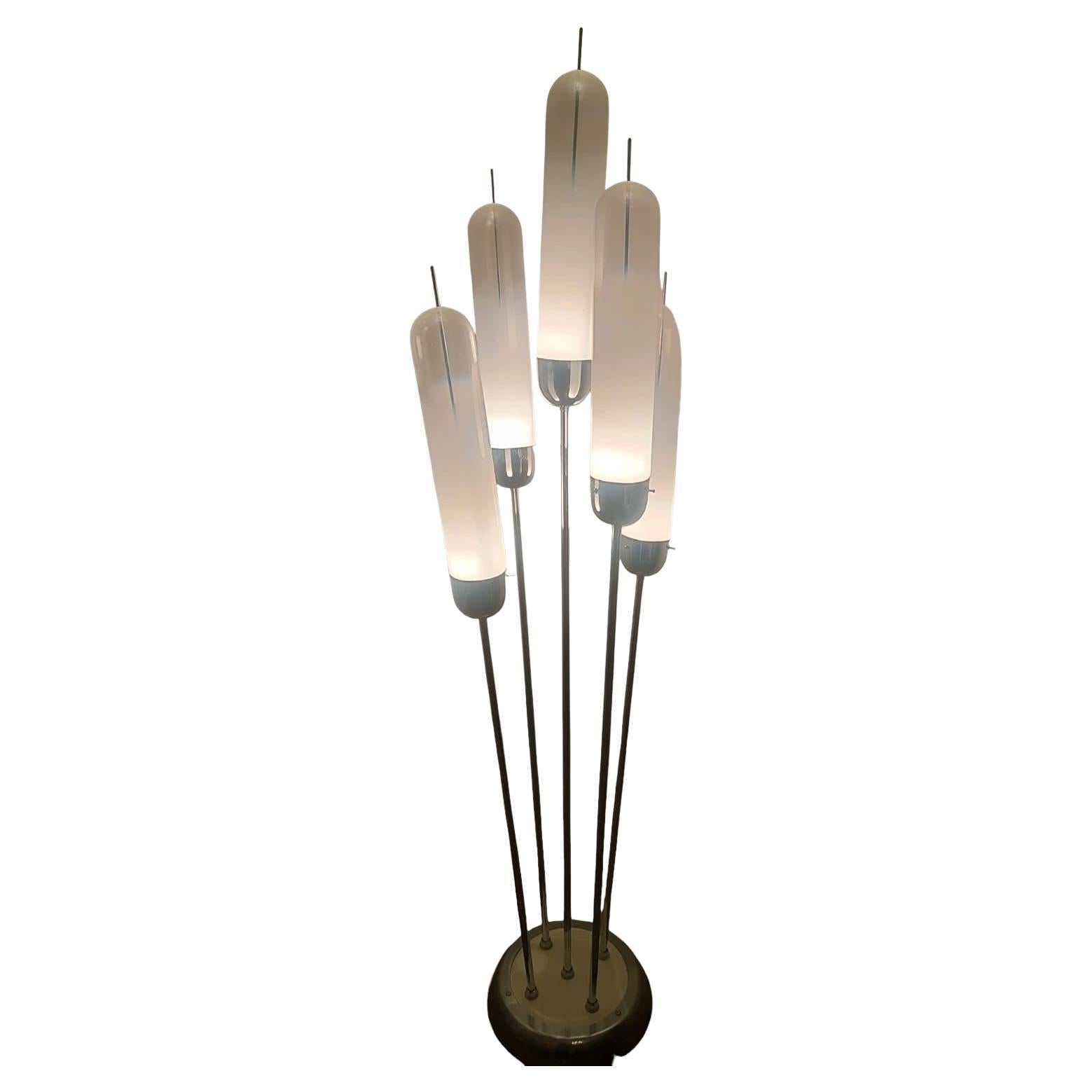 Five-light floor lamp by Carlo Nason for Mazzega, produced in the 1970s, with chrome metal frame and diffusers in  murano glass.
The diffusers, mounted on metal stems at various lengths, are made of blown glass in shaded white, making the color of