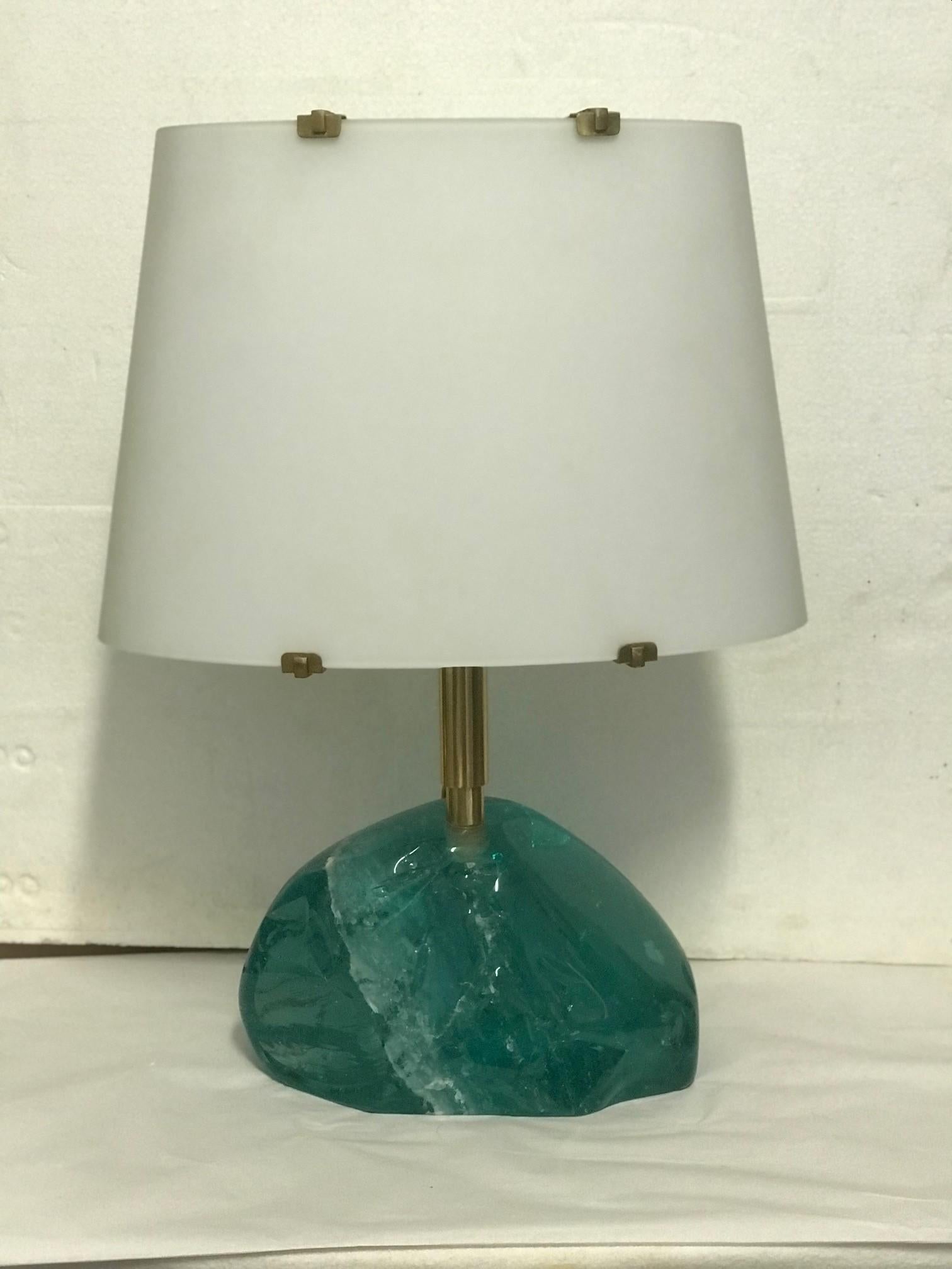 Lamp by Roberto Giulio Rida ROCCIA PICCOLA

Single table lamp made entirely by hand in Italy.
This lamp by Roberto Giulio Rida is constructed from a hand-ground crystal base into which is inserted the brass structure that supports the shade and on
