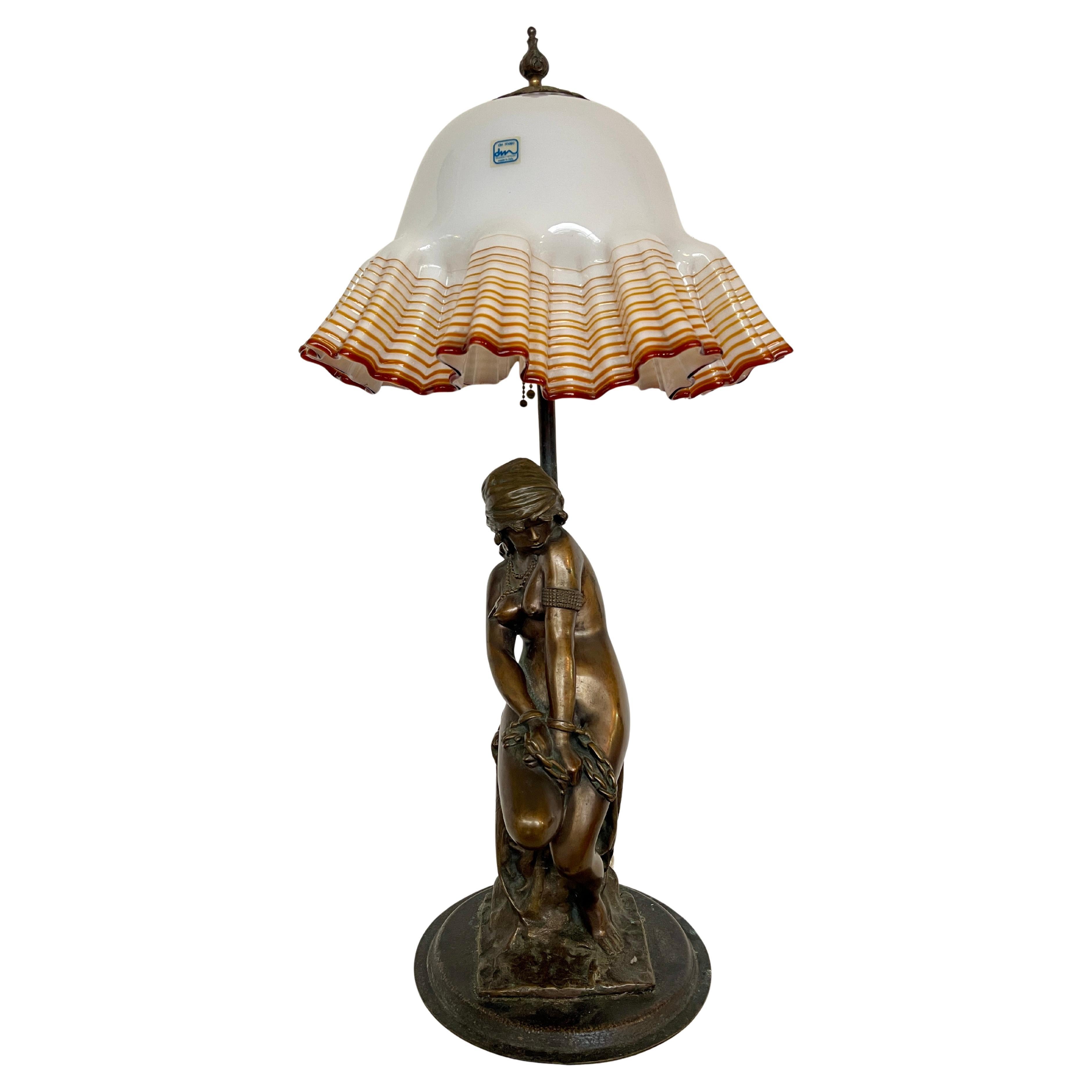 Art Nouveau 20th century bronze and murano glass figural lamp