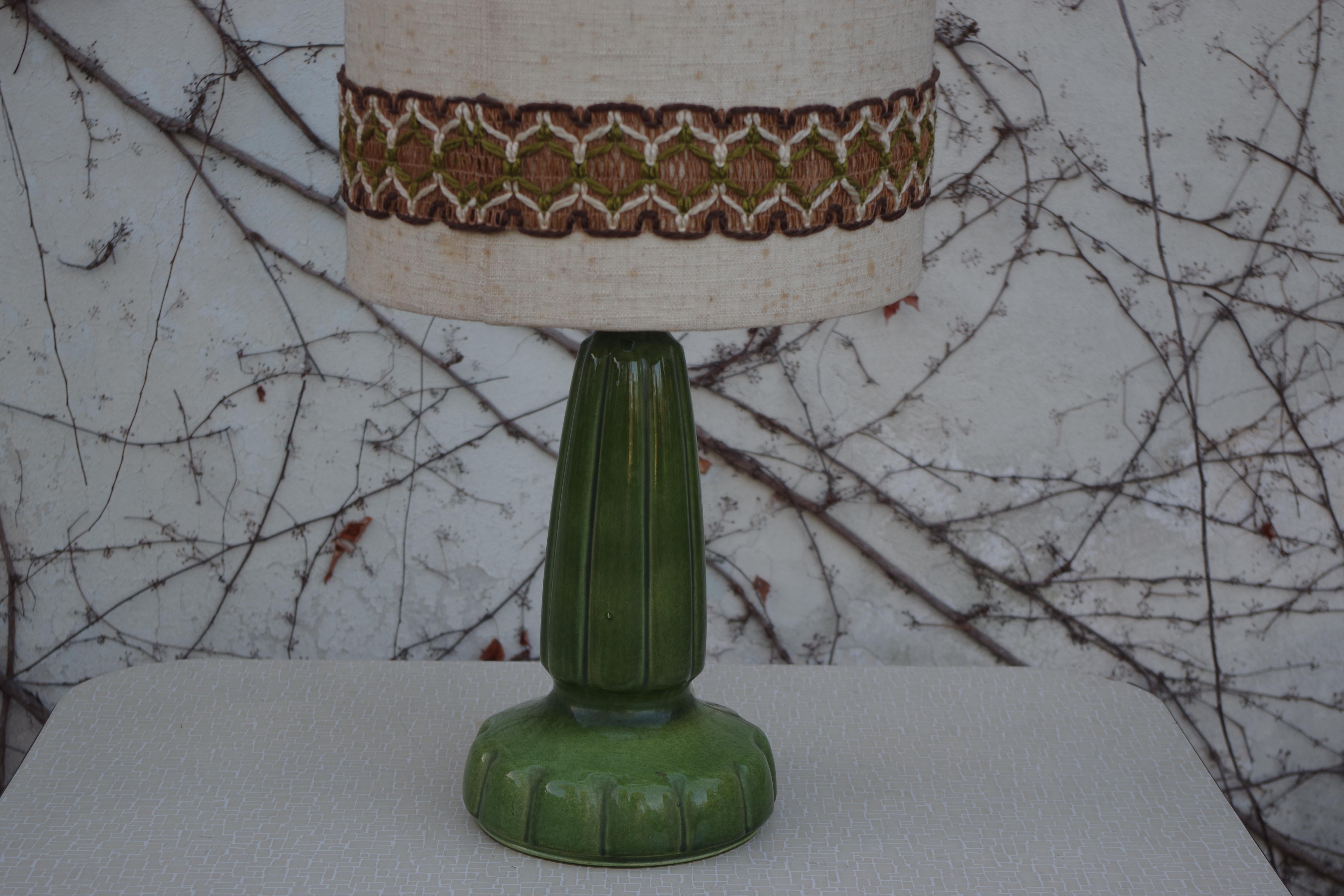 1950s green ceramic lamp with beige cotton fabric hat with hand embroidered band.