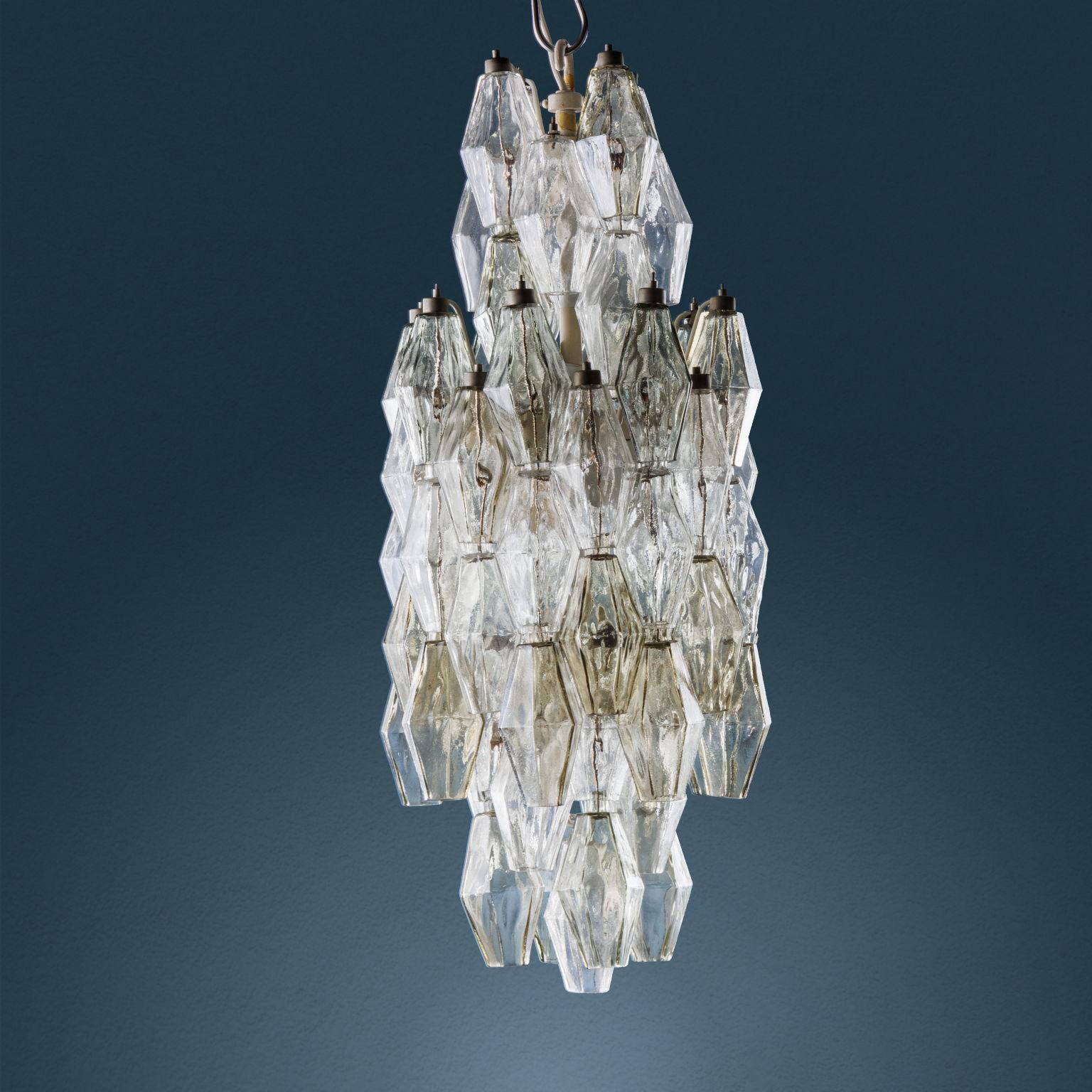 Pendant lamp designed by Carlo Scarpa and produced by Venini from the Poliedri series. Metal frame and Murano glass elements, 1960s. In very good original condition. 