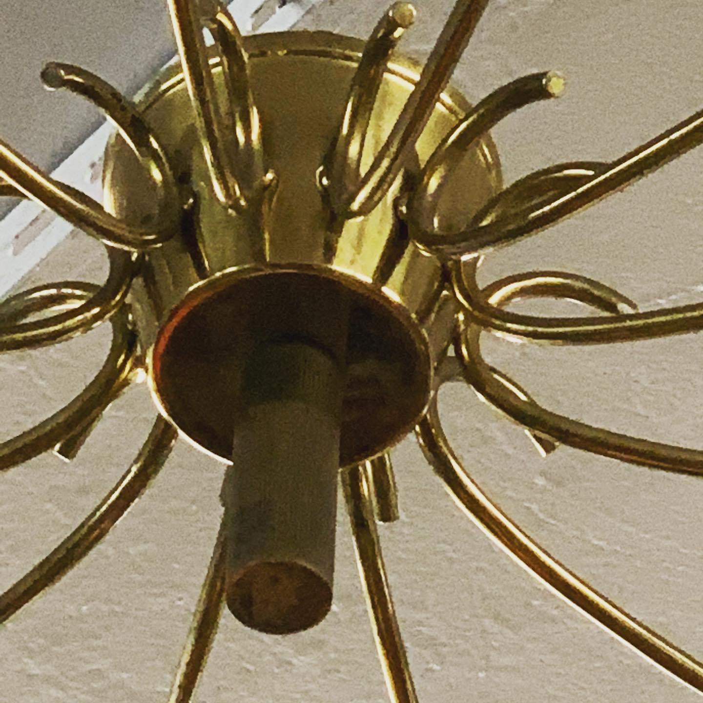 Italian 12-Arm Spoked Chandelier Entirely in Brass - Italy 1950s For Sale