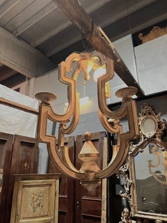 Carved and gilded wooden pendant chandelier, italy
