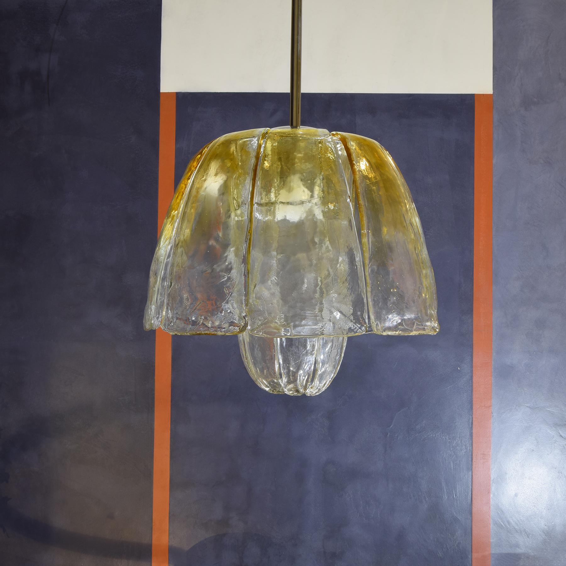 1970s chandelier attributable to Carlo Nason for Mazzega steel structure and worked and curved Murano glass

When you purchase vintage design products on our website, the cost includes secure and careful packaging. Each item will be protected with a
