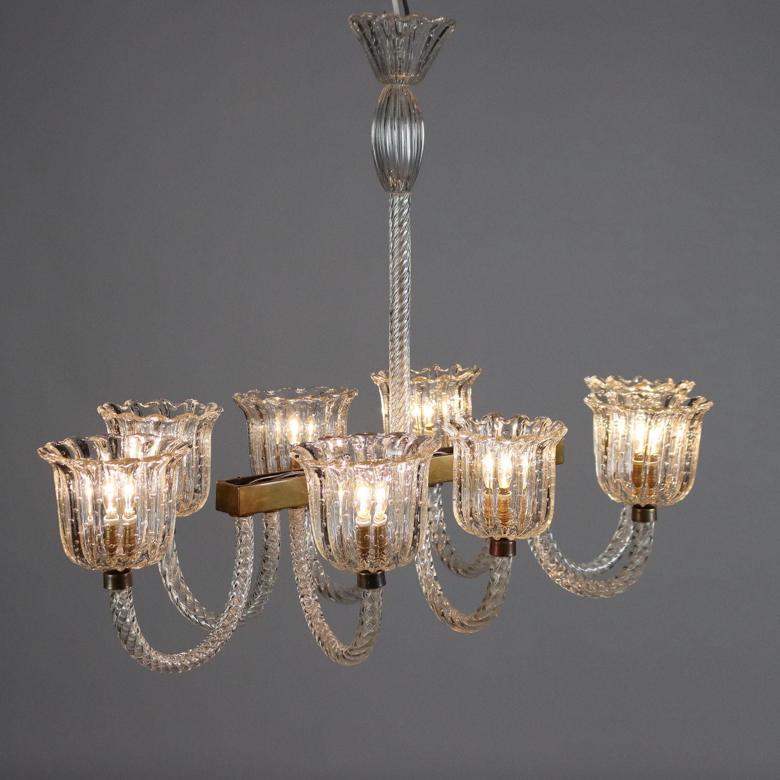 1940s Italian-made eight-point lamp made of Murano glass worked with brass details. 
