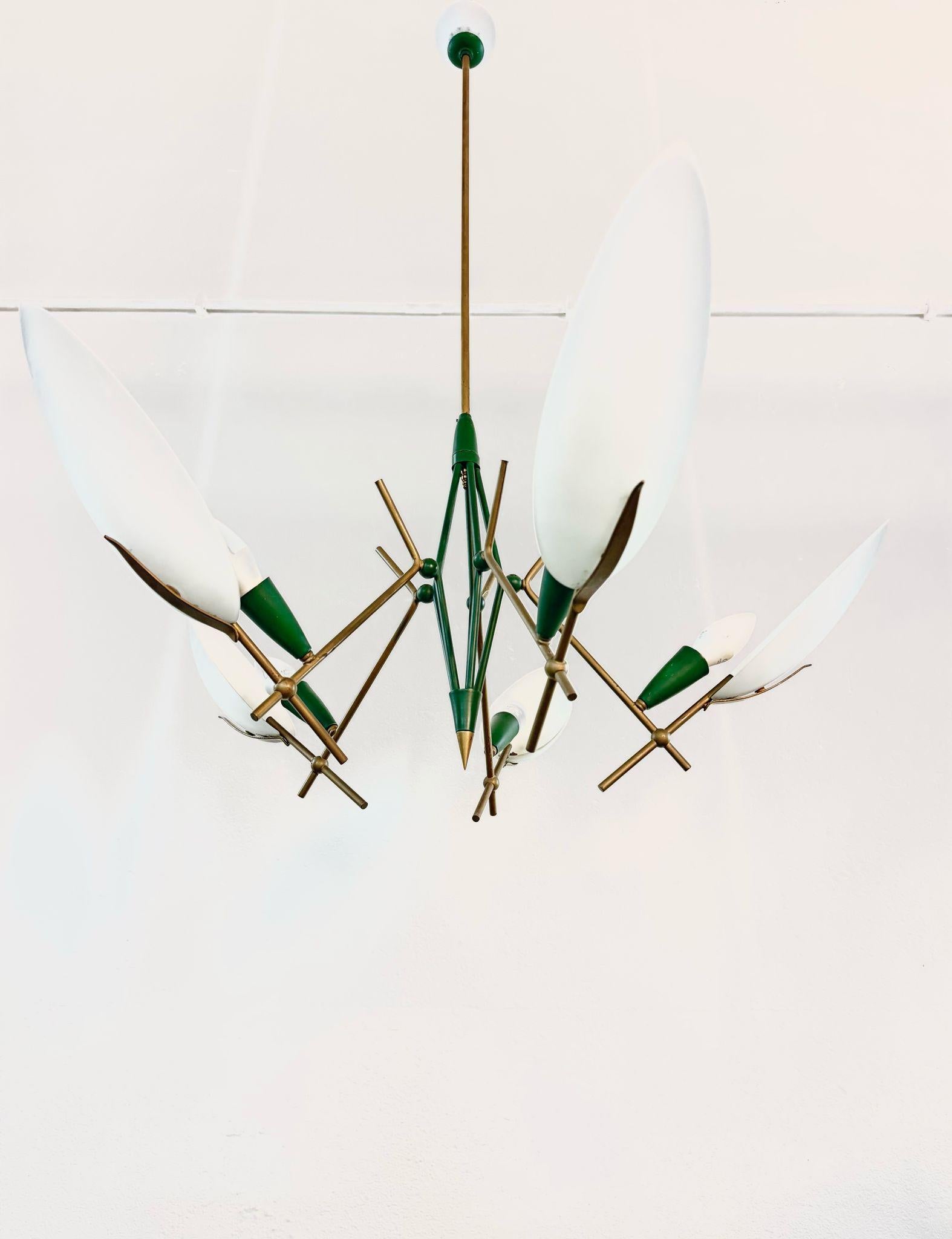 Chandelier in the Stilnovo-Sputnik style, circa 1950s-60s. Brass structure, with  six brass arms each ending in green lacquered brass cups and opaline glass shades. Good condition as pictured, light wear compatible with years.