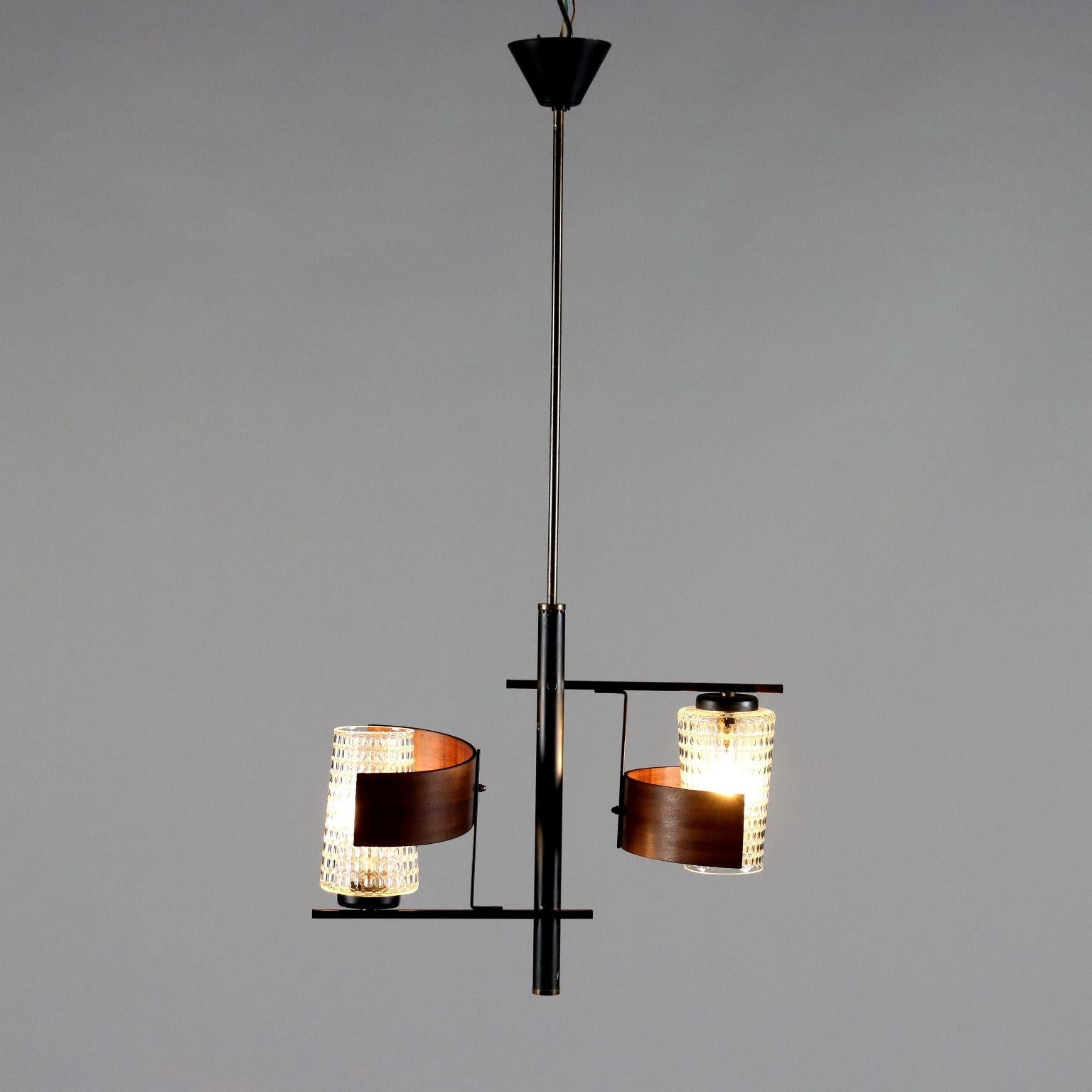 Ceiling lamp made of enameled aluminum, brass, curved teak wood and glass diffusers. 