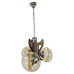 1960s wood and metal chandelier with three glass ceiling lights