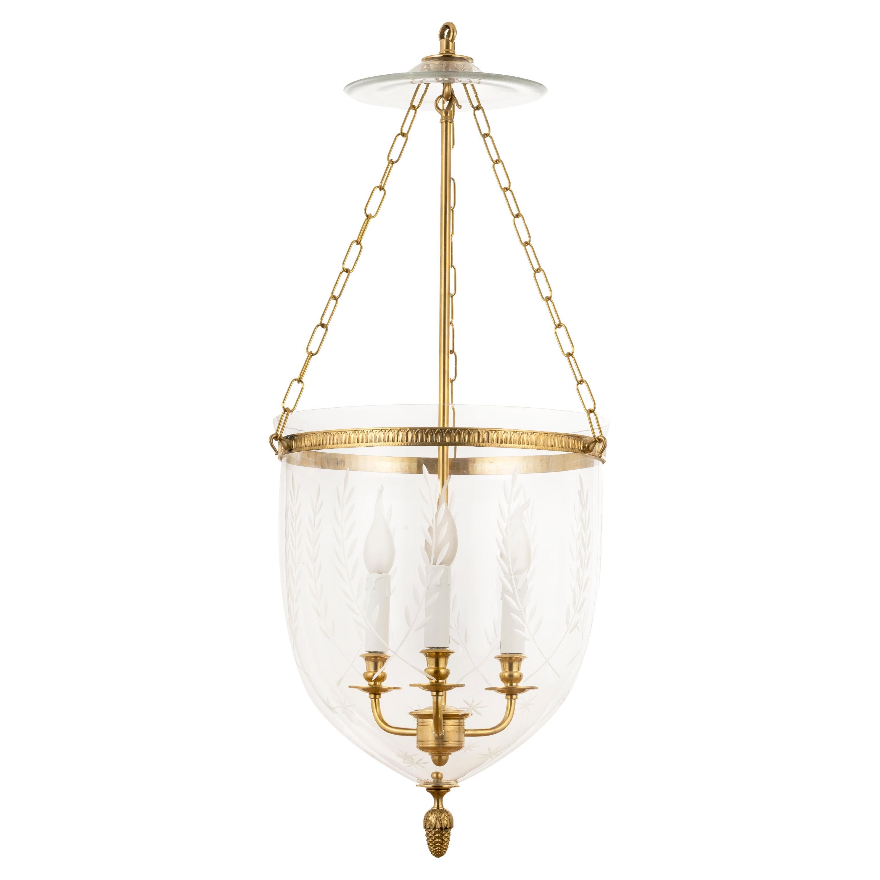 Classic hand-cut glass and brass chandelier For Sale