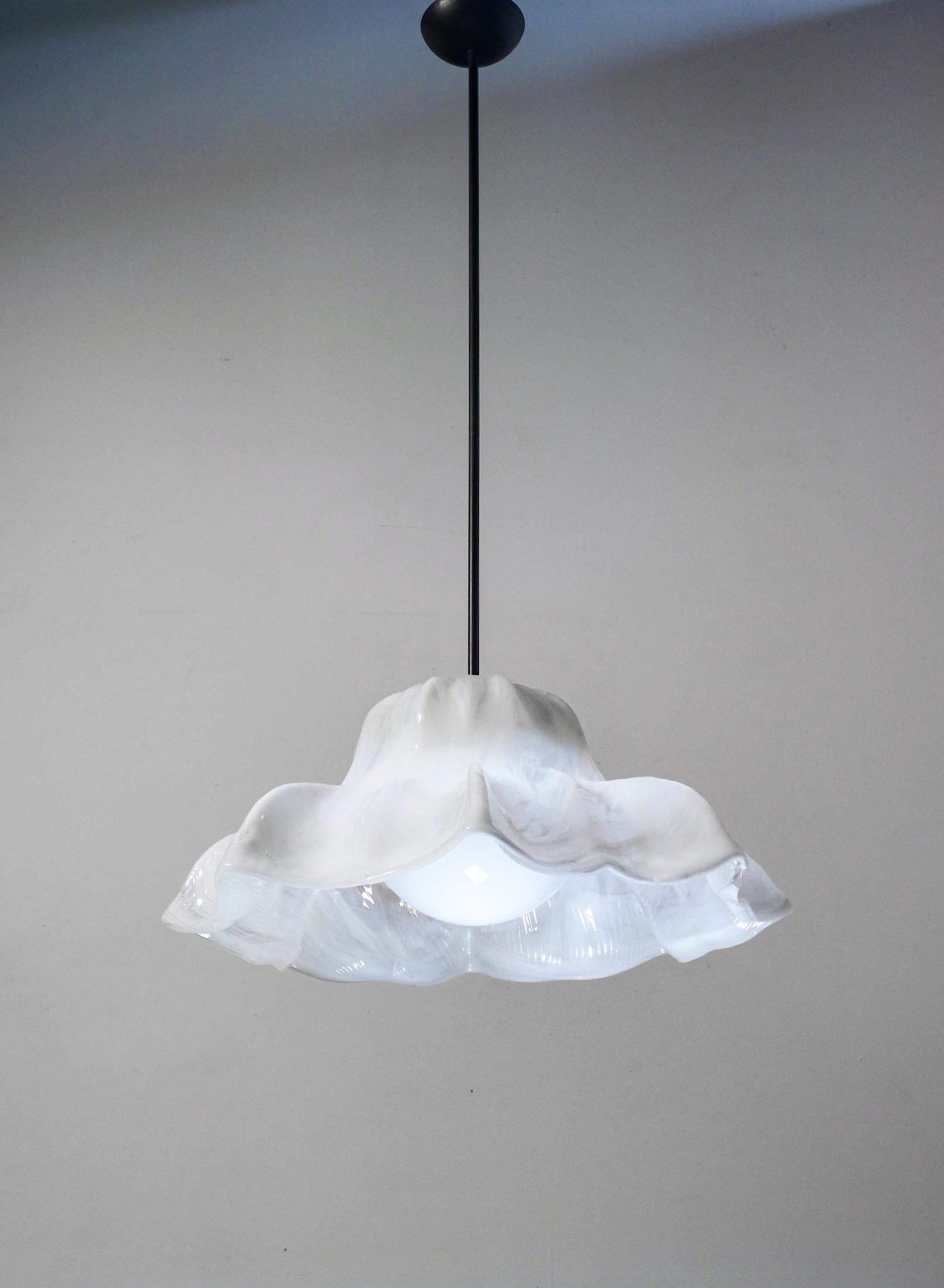 Glass Chandelier
blown series
Water lilies
design Toni ZUCCHERI
for VENINI.

ORIGIN
Italy

PERIOD
Anni 60

DESIGNER
TONI SUGAR
Son of the animal rights painter Luigi Zuccheri, he inherits his passion for animals, recurring subjects in his creations.