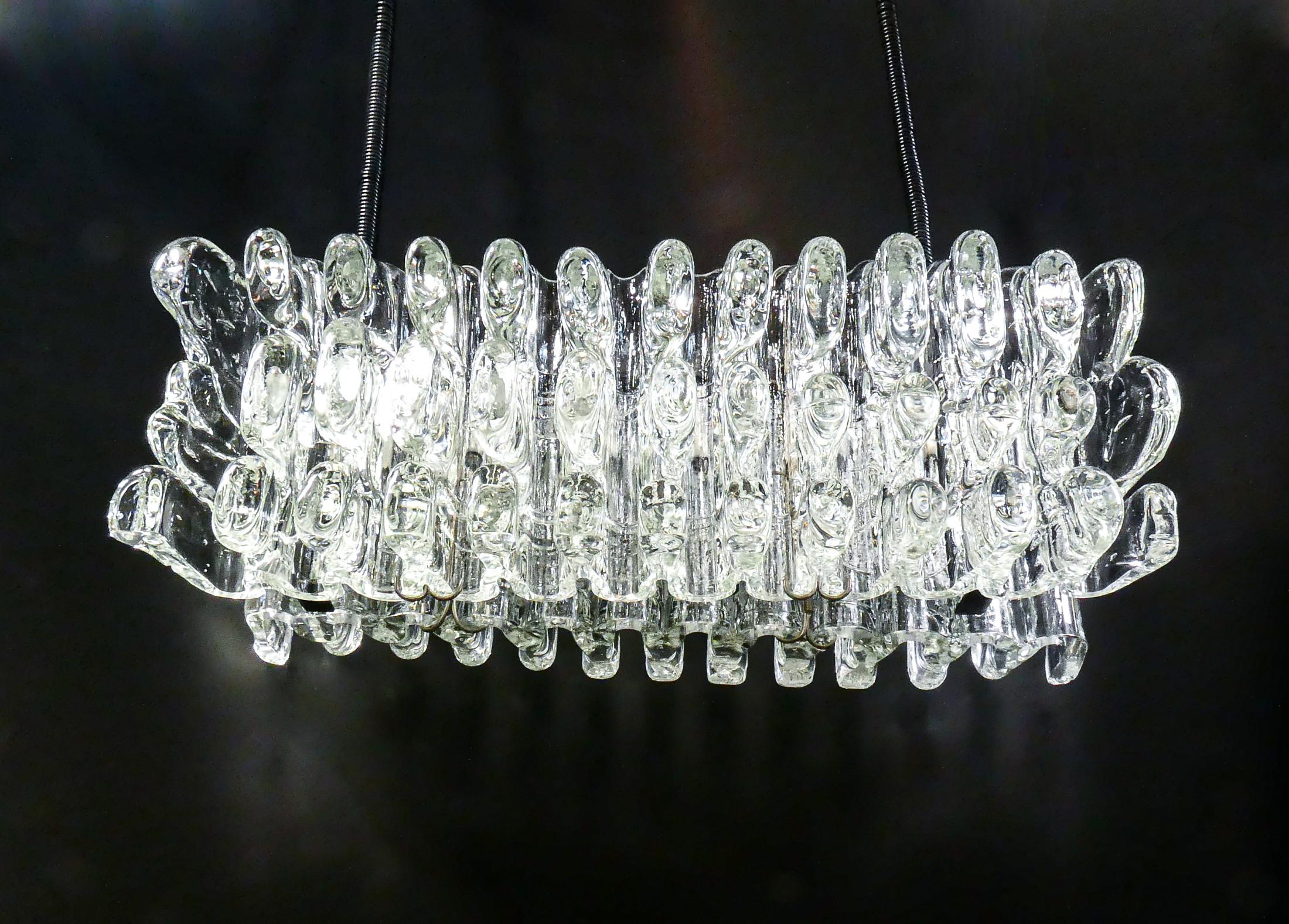 Late 20th Century F.lli TOSO design chandelier, blown glass diffusers. Murano. Italy, 1970s For Sale