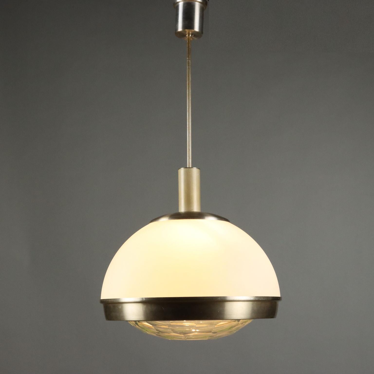 Ceiling lamp made of opal glass, clear glass and brass-plated aluminum. 