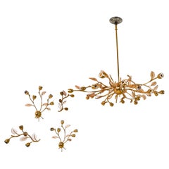 Brass chandelier and 4 wall sconces with glass elements, 1970s