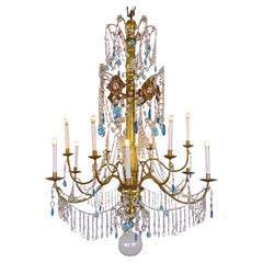 1780 Lustre italien Empire génois en bois doré et cristal Douze lumières
