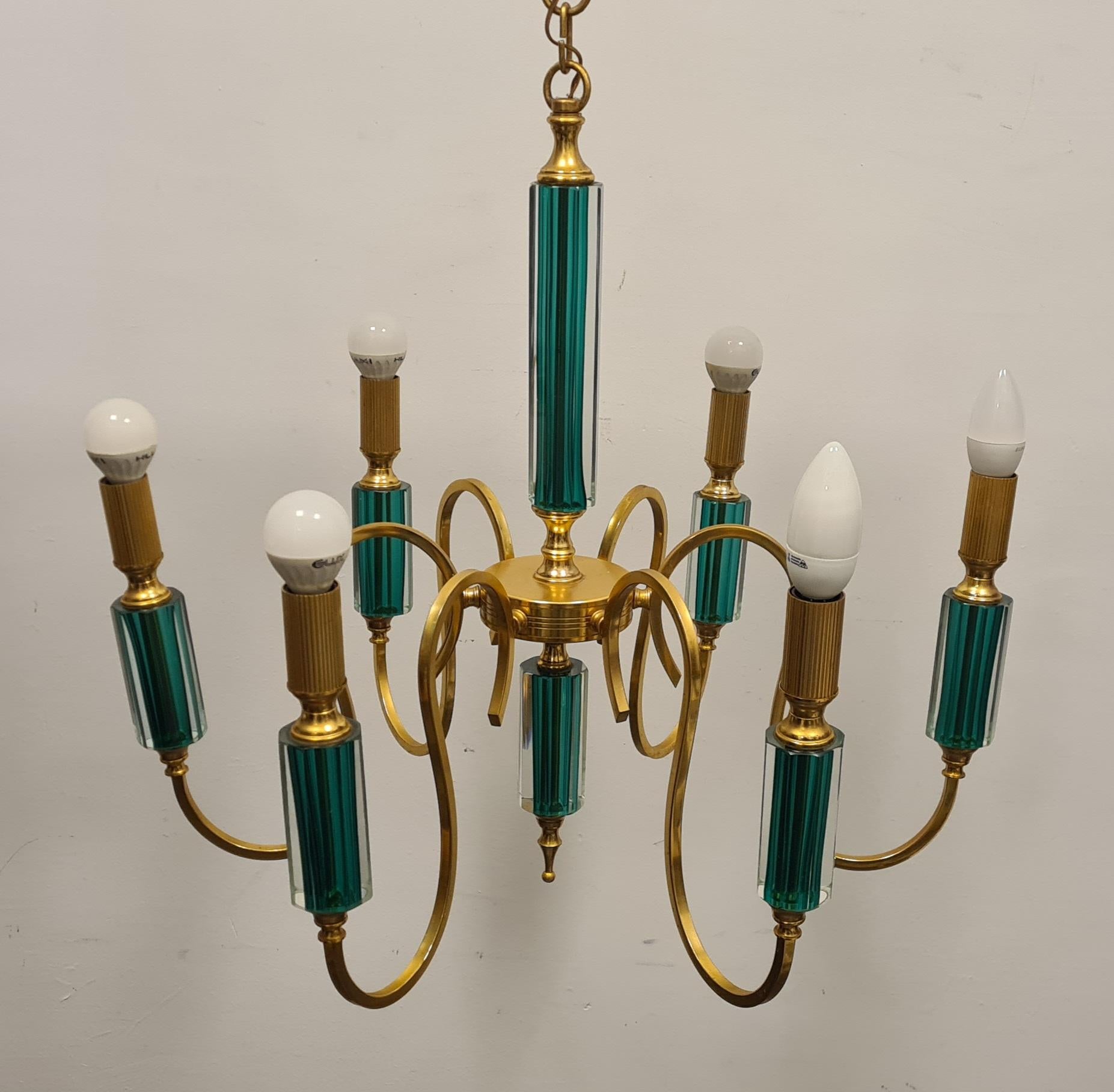 Gilded metal and submerged glass chandelier 1980s' In Good Condition For Sale In Torino, IT