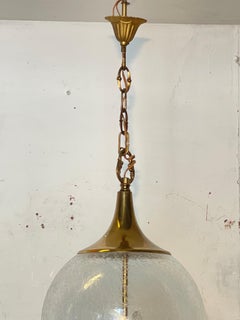 Brass chandelier with worked glass sphere, "Luce Nobile," 1970s