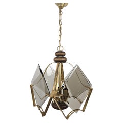 1970s brass and smoked glass chandelier with three light points