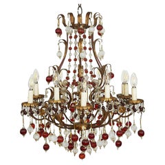 Italian Gilded Iron and Red and White Glass Chandelier circa 1960, Twelve Lights
