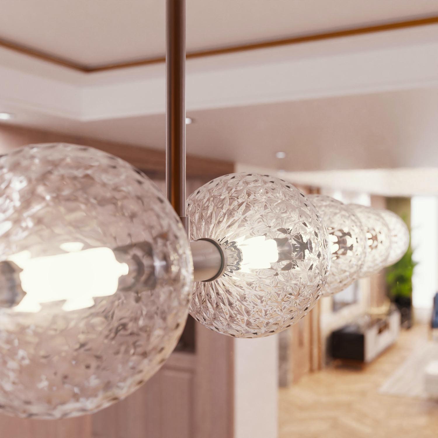 CARAVAGGIO è un lampadario a sospensione con 8 luci led.‎
Sfere di luce per una lampada pendente raffinata.‎

Questa creazione di illuminazione è realizzata completamente a mano dai Maestri vetrai secondo antiche e segrete tradizioni tramandate di