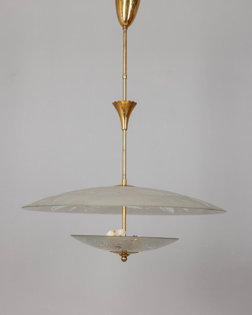 Chandelier with gilt brass frame and crystals with floral decorations, Italian design, 1940s.

CONDITION:
In good, working condition, may show signs of wear given by time.

SIZING:
Height 75 cm; Diameter 57 cm