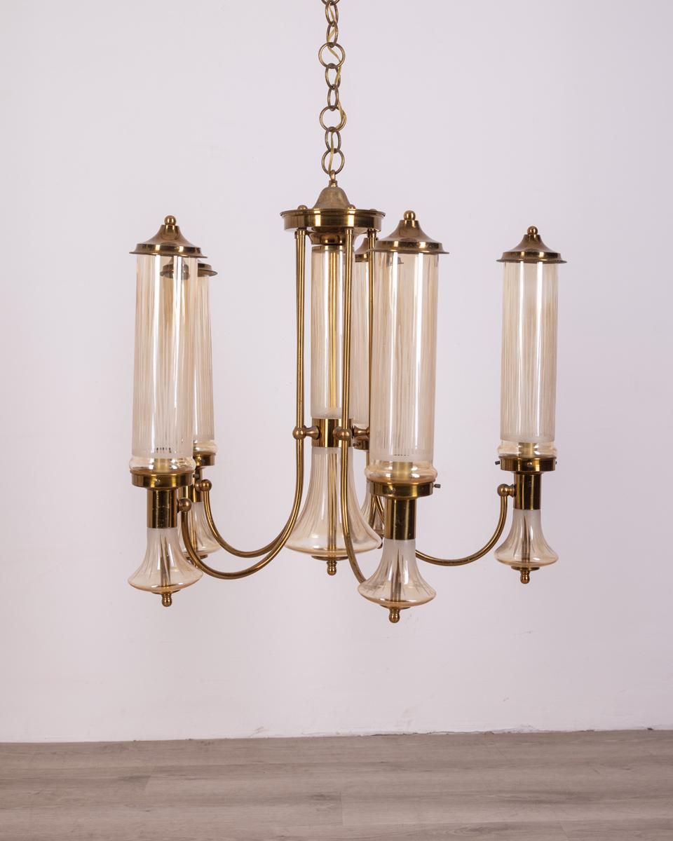 Six-light chandelier of gilt brass and decorated cylindrical glass, made in Japan, 1960s.

CONDITION:
In good condition, may show signs of wear given by time.

SIZING:
Height 113 cm; diameter 65 cm;