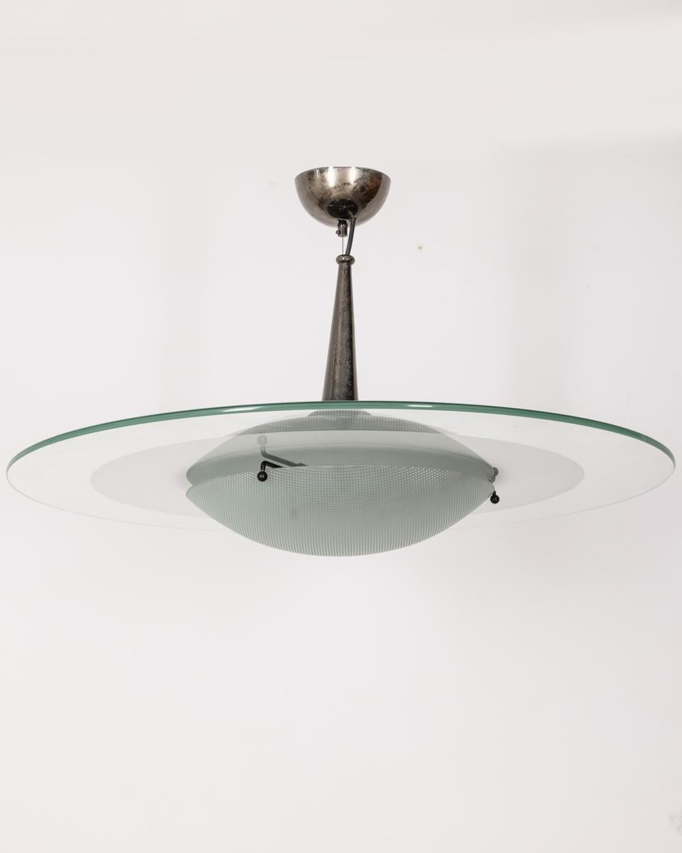 Chandelier with im metal frame and circular crystal, glass shade, Italian design, 1960s.

CONDITION: In good, working condition, may show signs of wear given by time.

DIMENSIONS: Height 42 cm; Diameter 80 cm

MATERIAL: Metal, Glass and
