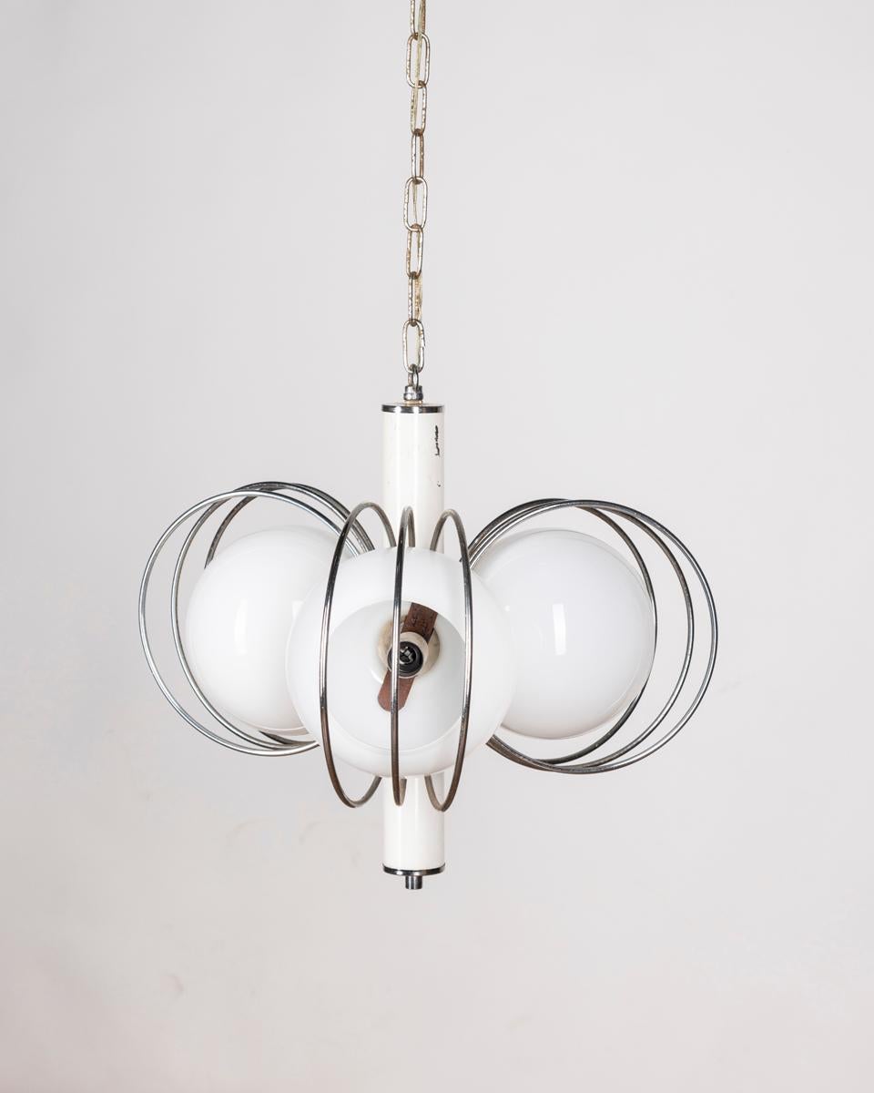 Chromed and white metal frame three-light chandelier with spherical white glass shades, Italian design, 1970s.

CONDITION: In good condition, working, shows signs of wear given by time.

DIMENSIONS: Height 92 cm; diameter 45 cm;

MATERIALS: Metal