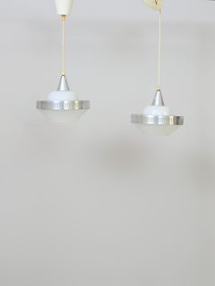 Lampade a sospensione in vetro e metallo