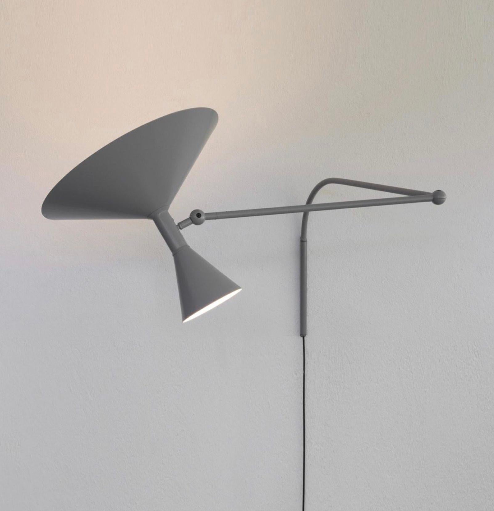 Mini Lampe de Marseille by Le Corbusier. Current production designed and manufactured in France by Nemo Lighting. Wired for U.S. standards. Spun aluminum diffuser. Adjust via two joints on the arm and a rotating wall joint. Provides direct and