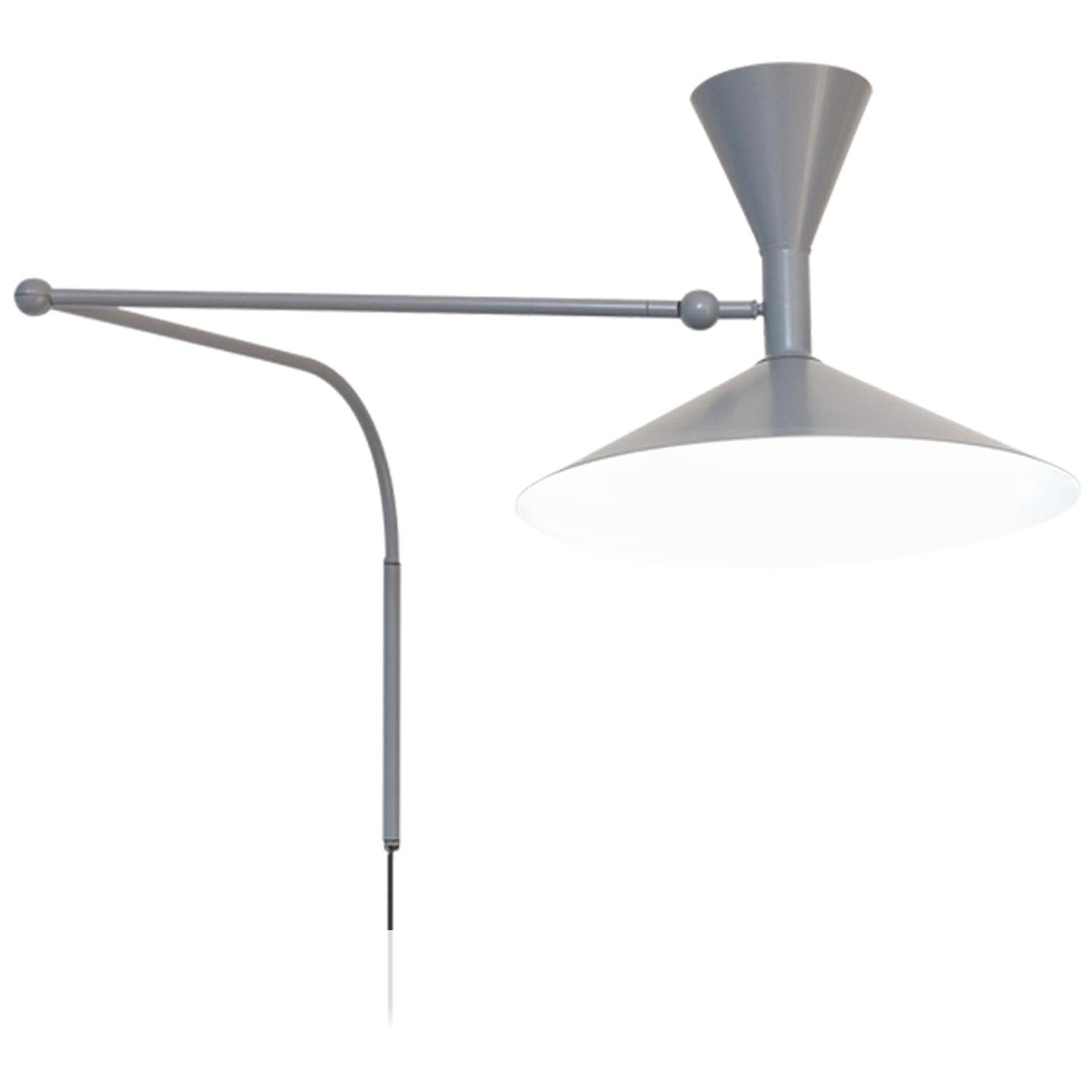 Lampe de Marseille by Le Corbusier. Current production designed and manufactured in France by Nemo Lighting. Wired for U.S. standards. Spun aluminum diffuser. Adjust via two joints on the arm and a rotating wall joint. Provides direct and indirect