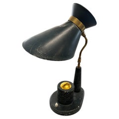 Lampe en cuir a poser Jacques Adnet