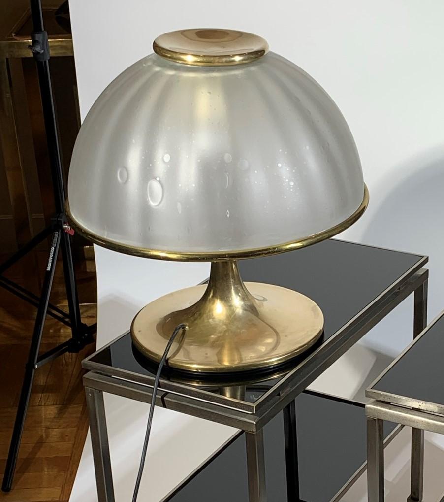 Golden round lamp with glass and brass dome.
Style of Gabriella Crespi.