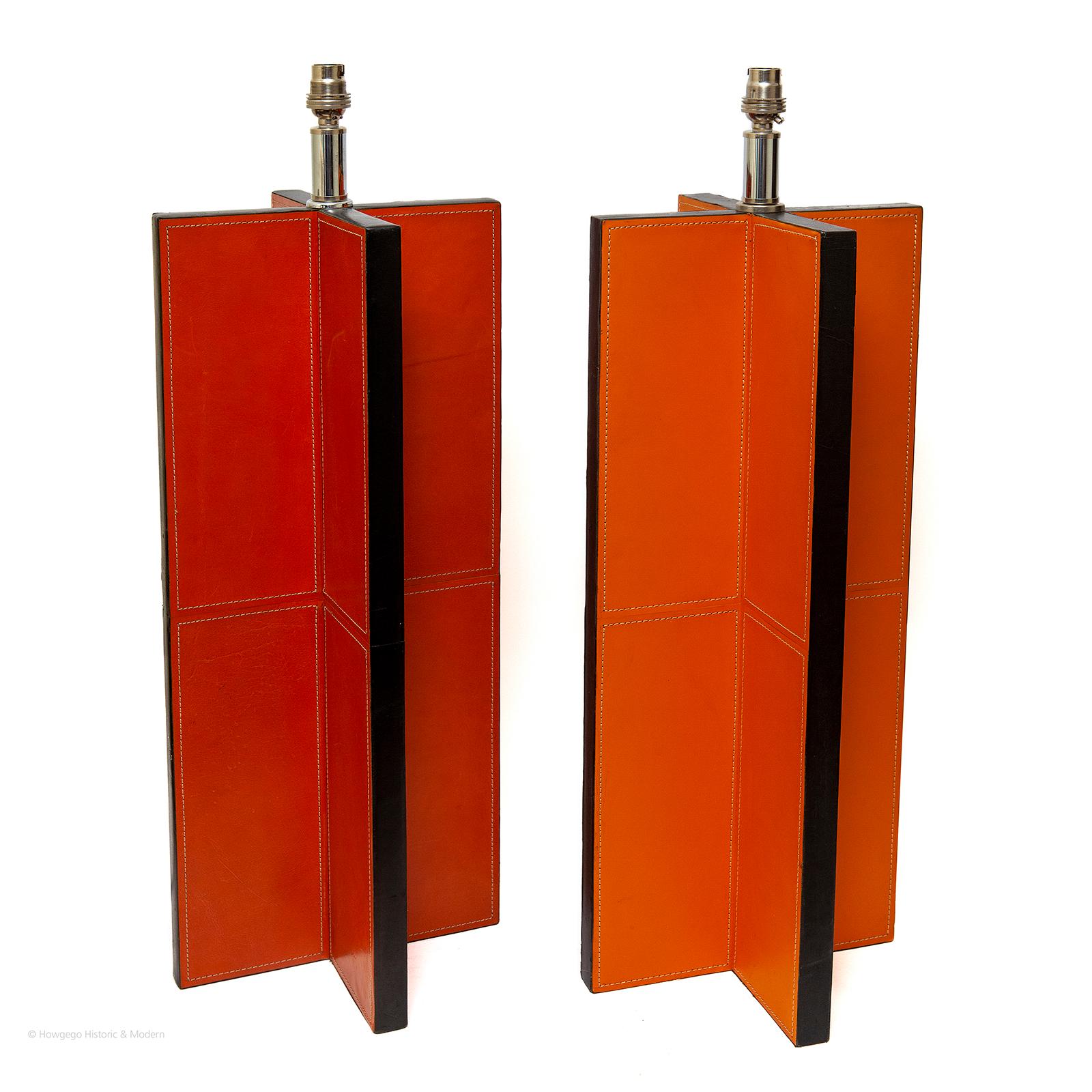 UNUSUAL & STRIKING PAIR OF TALL, VINTAGE, ORANGE, LEATHER TABLE LAMPS, 28” HIGH, INSPIRED BY JEAN MICHEL FRANK’S 1928, CROISILLON LAMP
Injecting bold colour and vibrancy into the interior
These lamps make a bold statement with their classic, simple