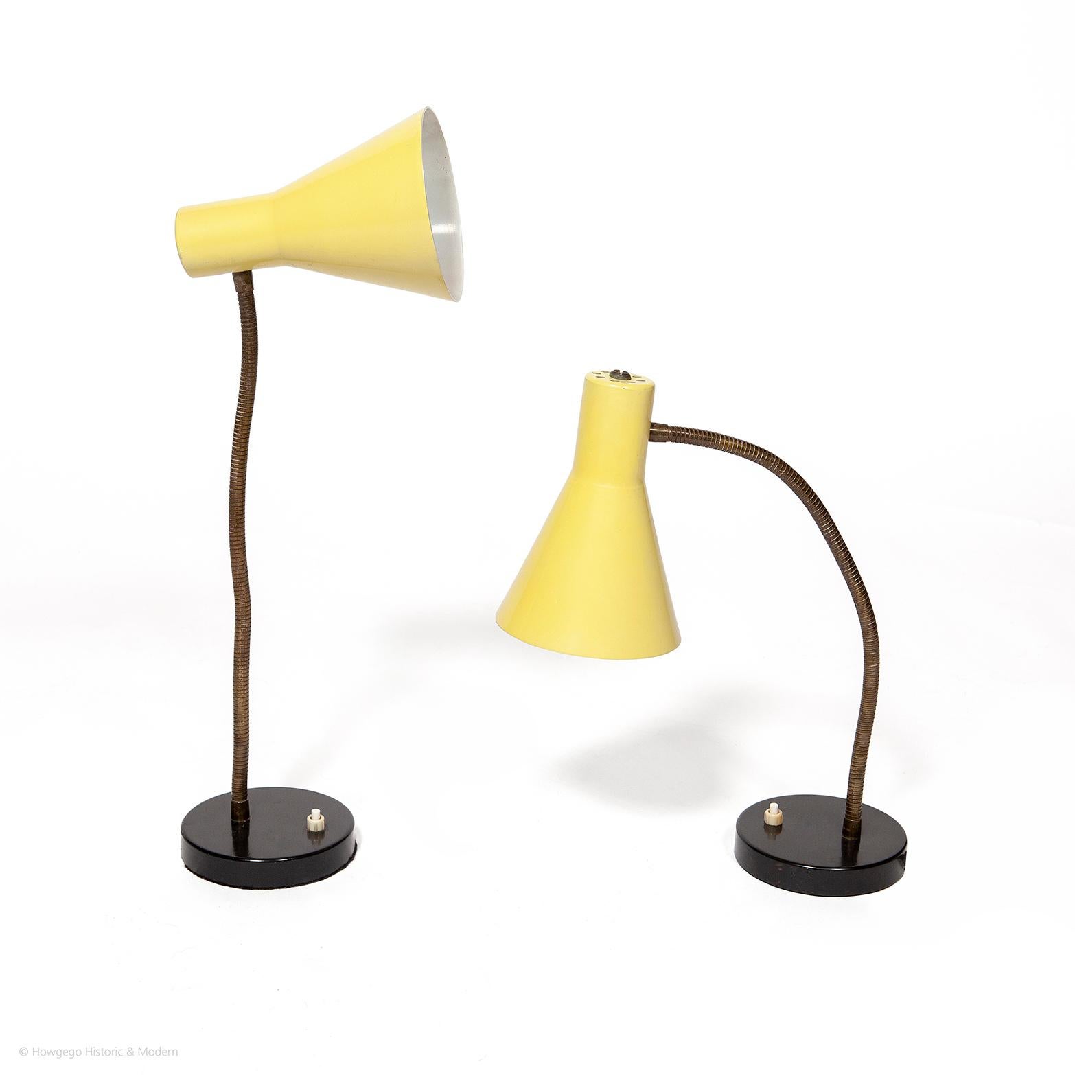 - Striking pair of Mid-Century Modern lamps
- In original condition
- Stylish design inspired by Stilnovo designs of the period
- Statement pieces injecting colour and fun into any interior

Original tapering yellow enamelled metal shades