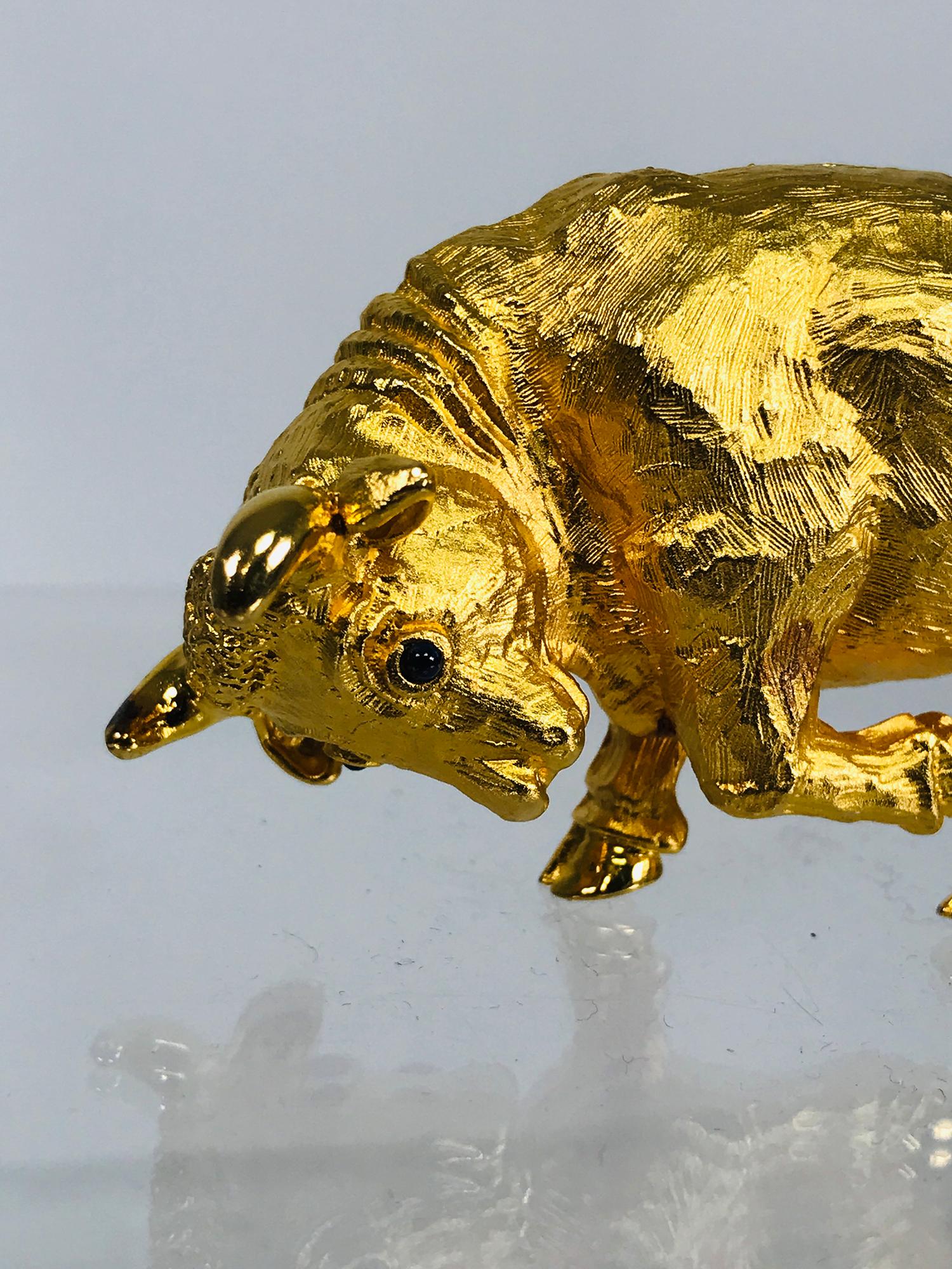 Lana Marks gold plated sterling silver vermeil belt buckle from her 1992 Zodiac collection. This highly detailed bull has dark blue glass eyes, he will also stand alone. Matte gold finish. Belt attaches at the back, prong to close belt is at the