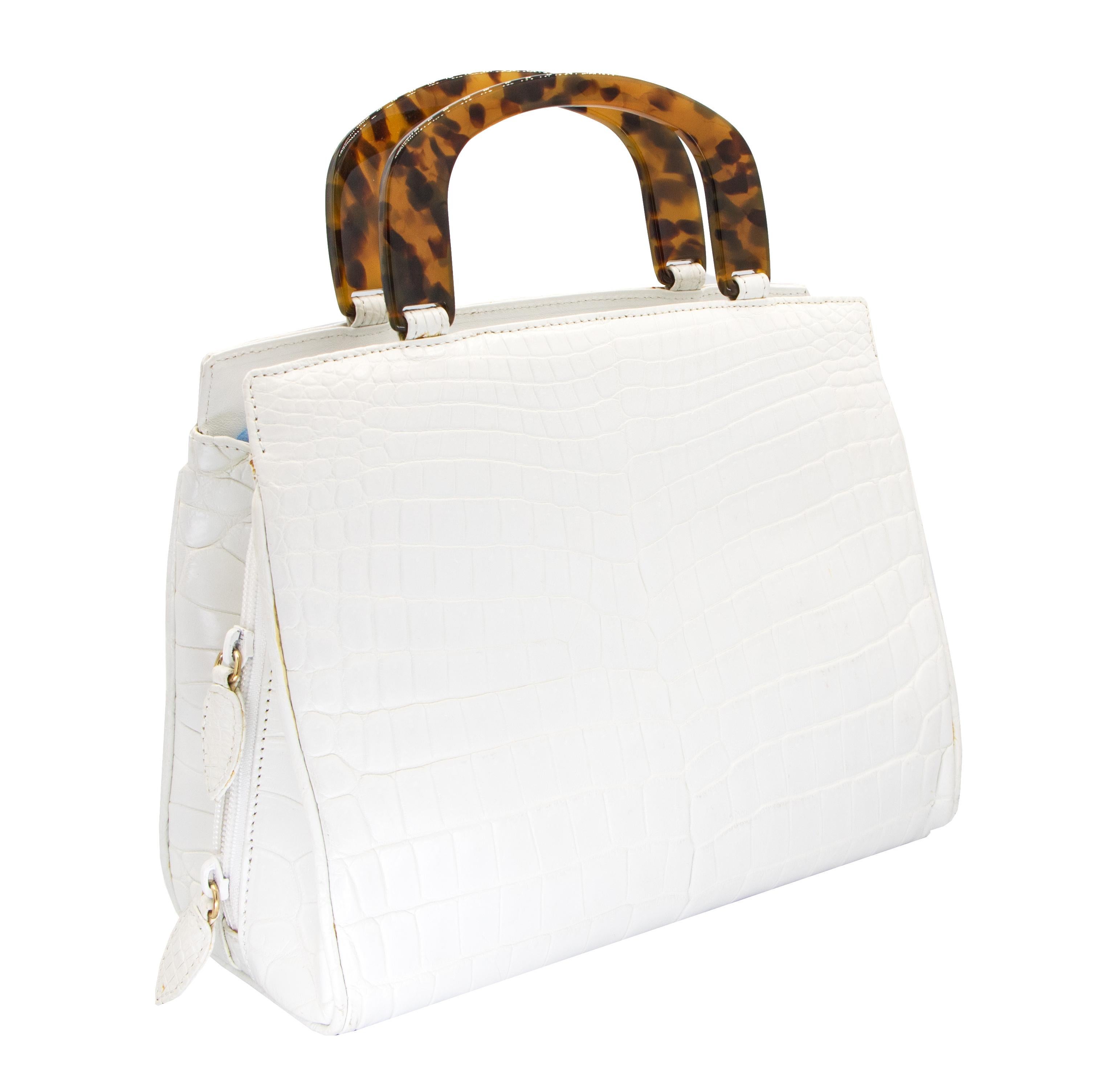 white crocodile purse
