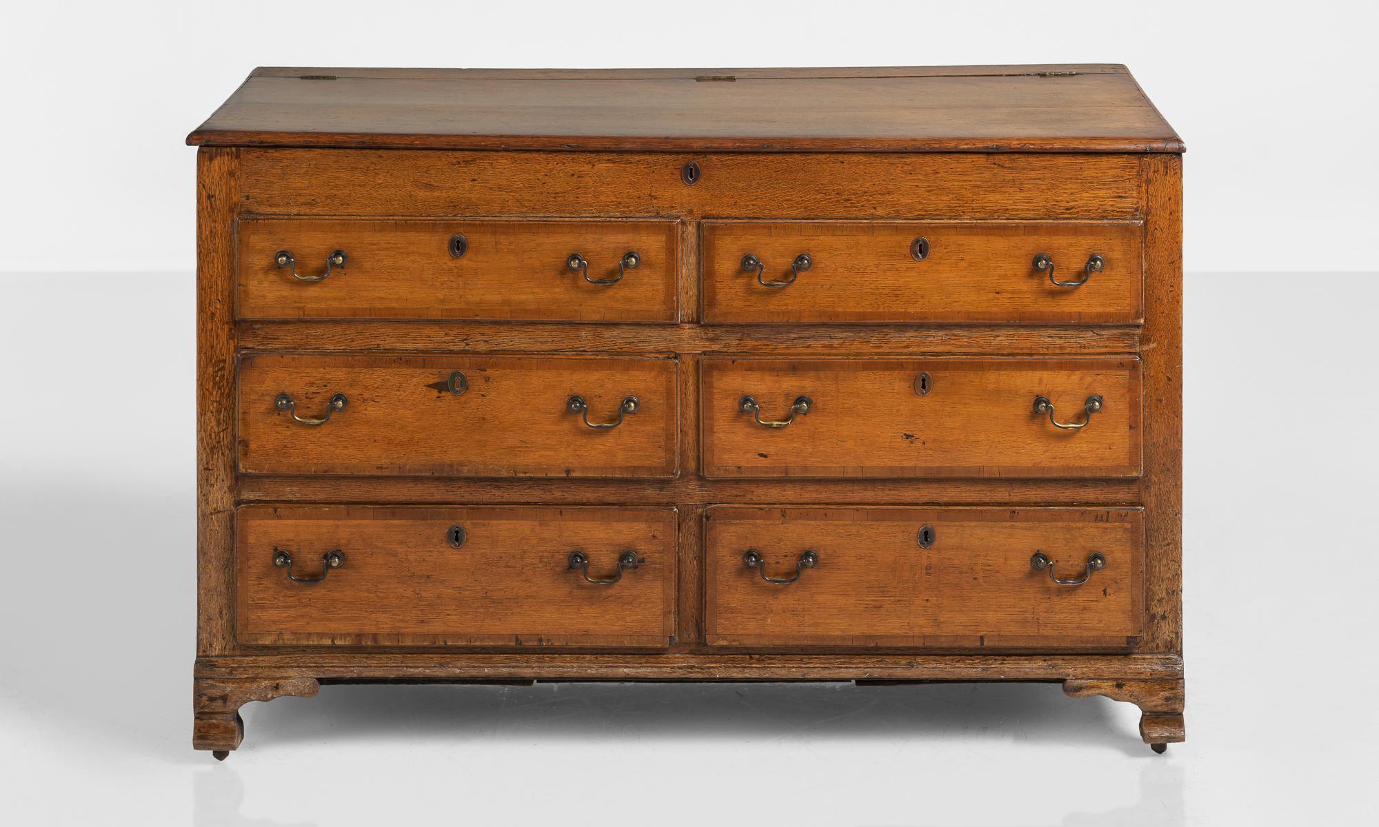Lancashire Oak Chest, England, circa 1790

Solid oak chest with original brass hardware. Top opens for storage.