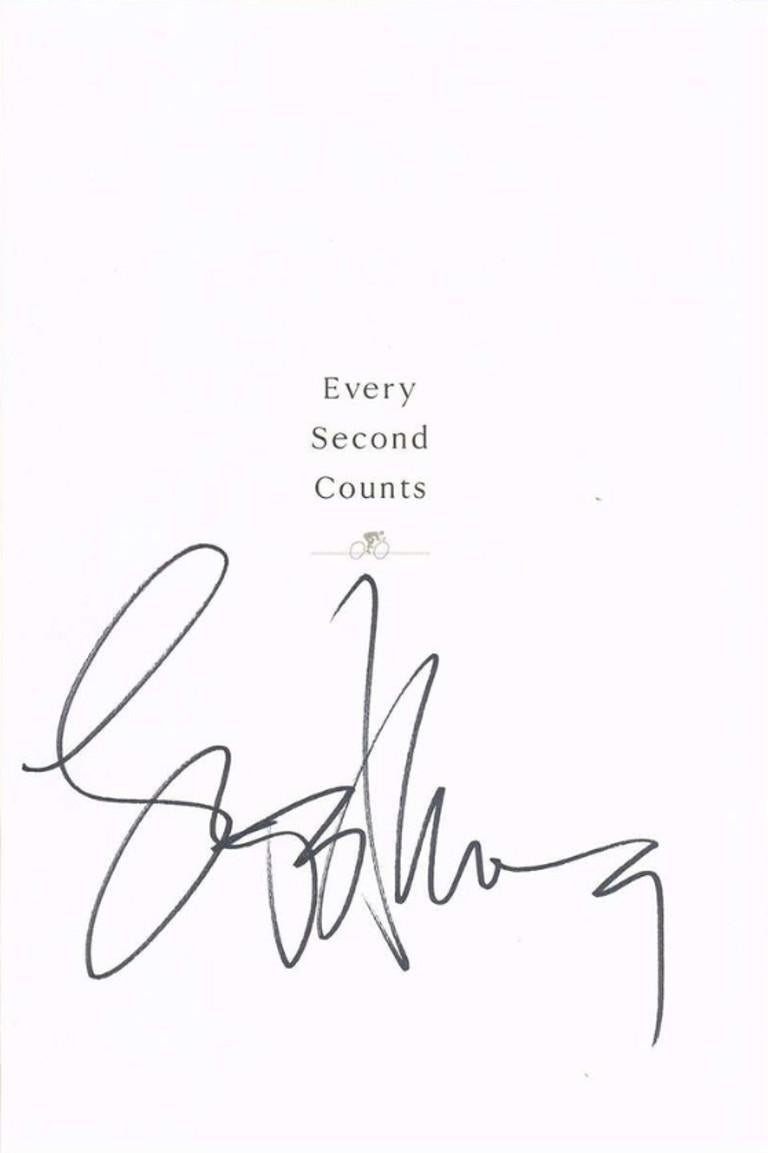 A hardcover example (with dust-jacket) of Armstong's autobiography Every Second Counts, measuring 6½