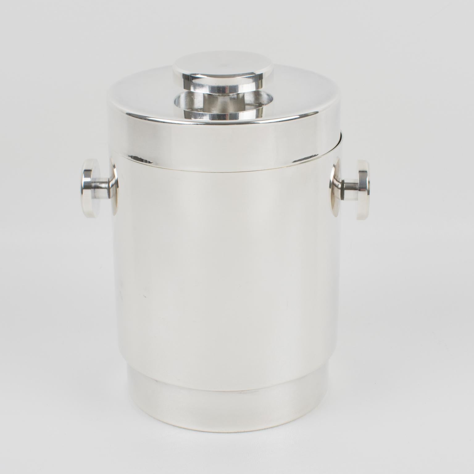Lancel France crafted this modernist lidded ice bucket or wine cooler circa 1970. This vintage piece is still in its original gift-storage box. This silver plate ice bucket features a streamlined design with minimalist lines, ornate with flat